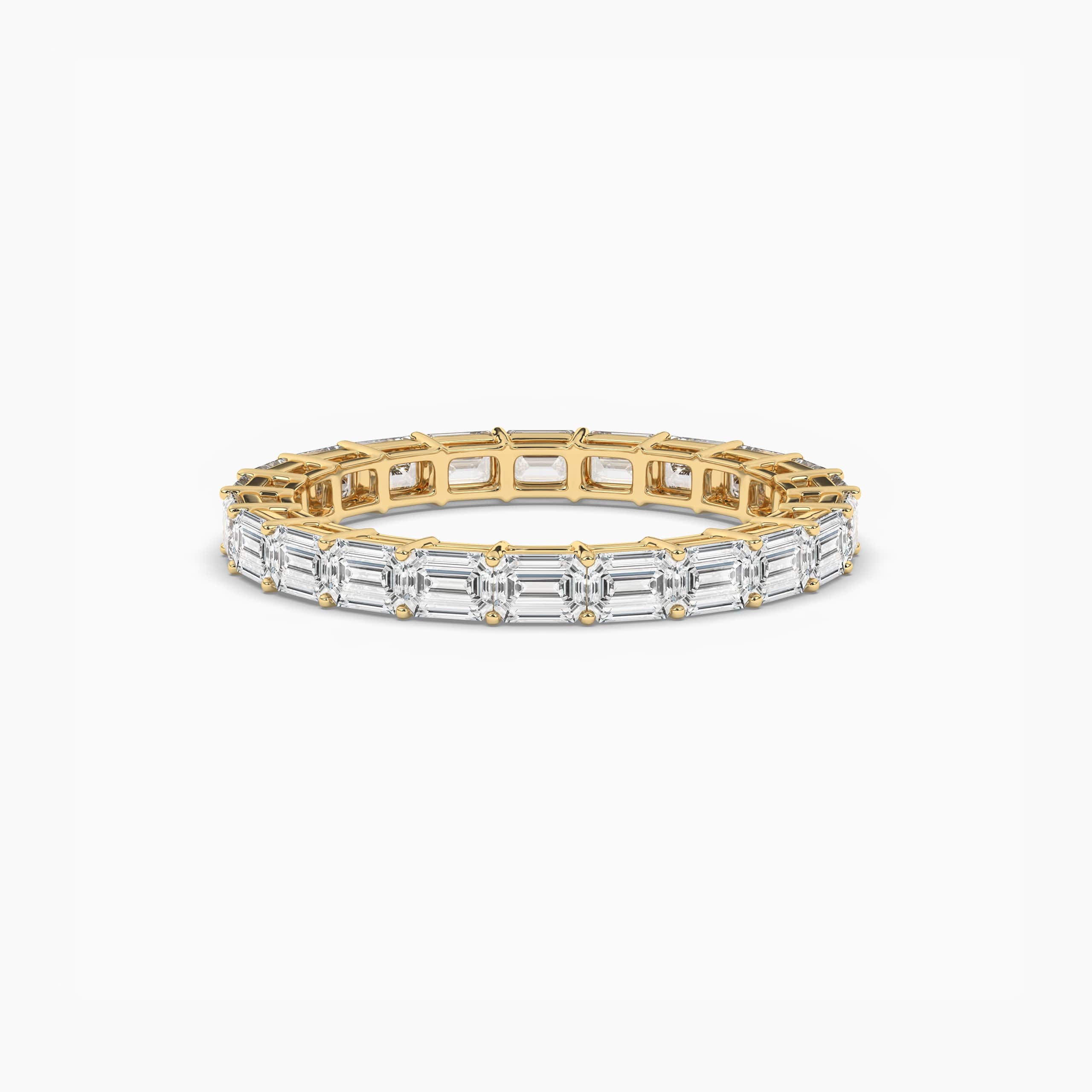 east west emerald cut eternity band