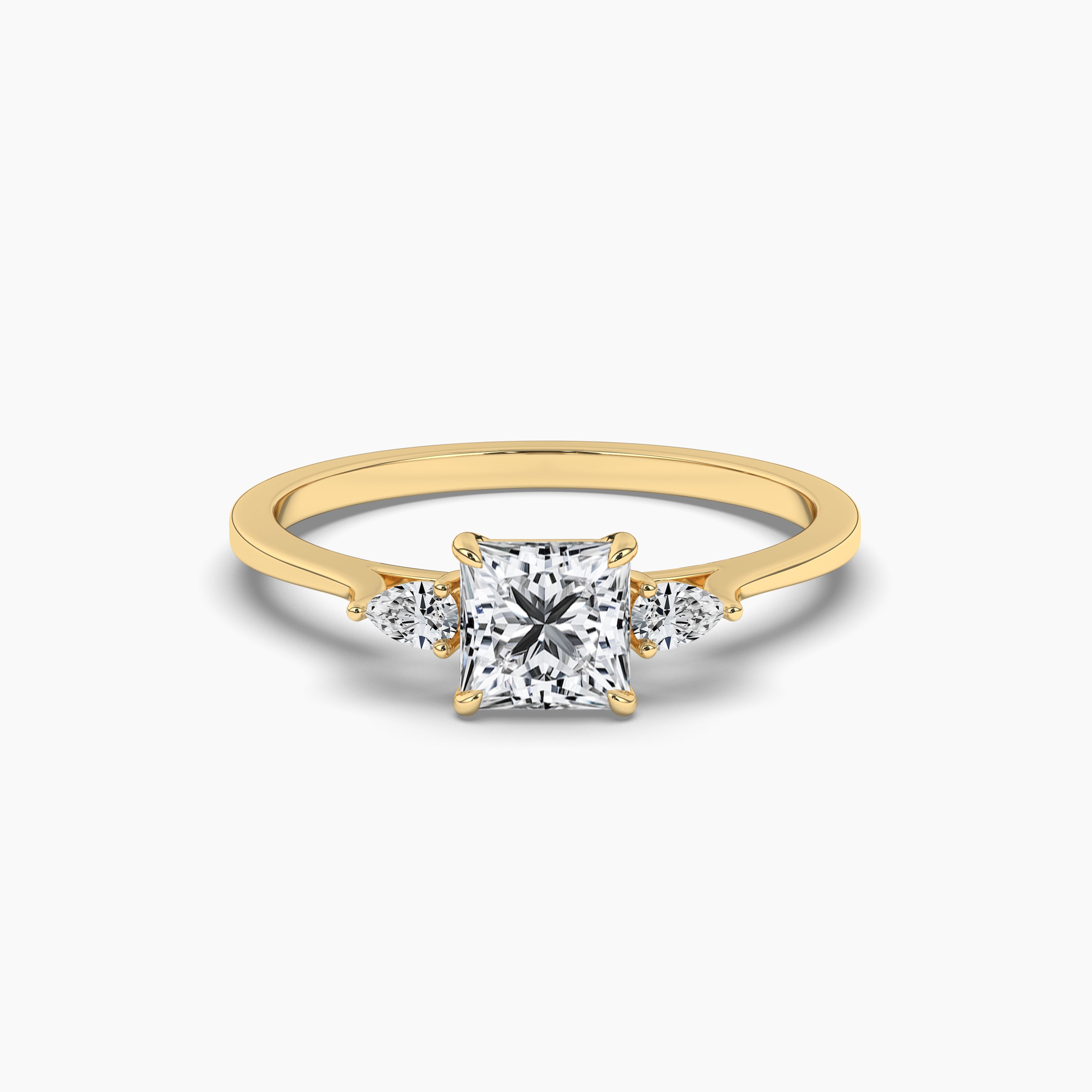 pear side stones in yellow gold