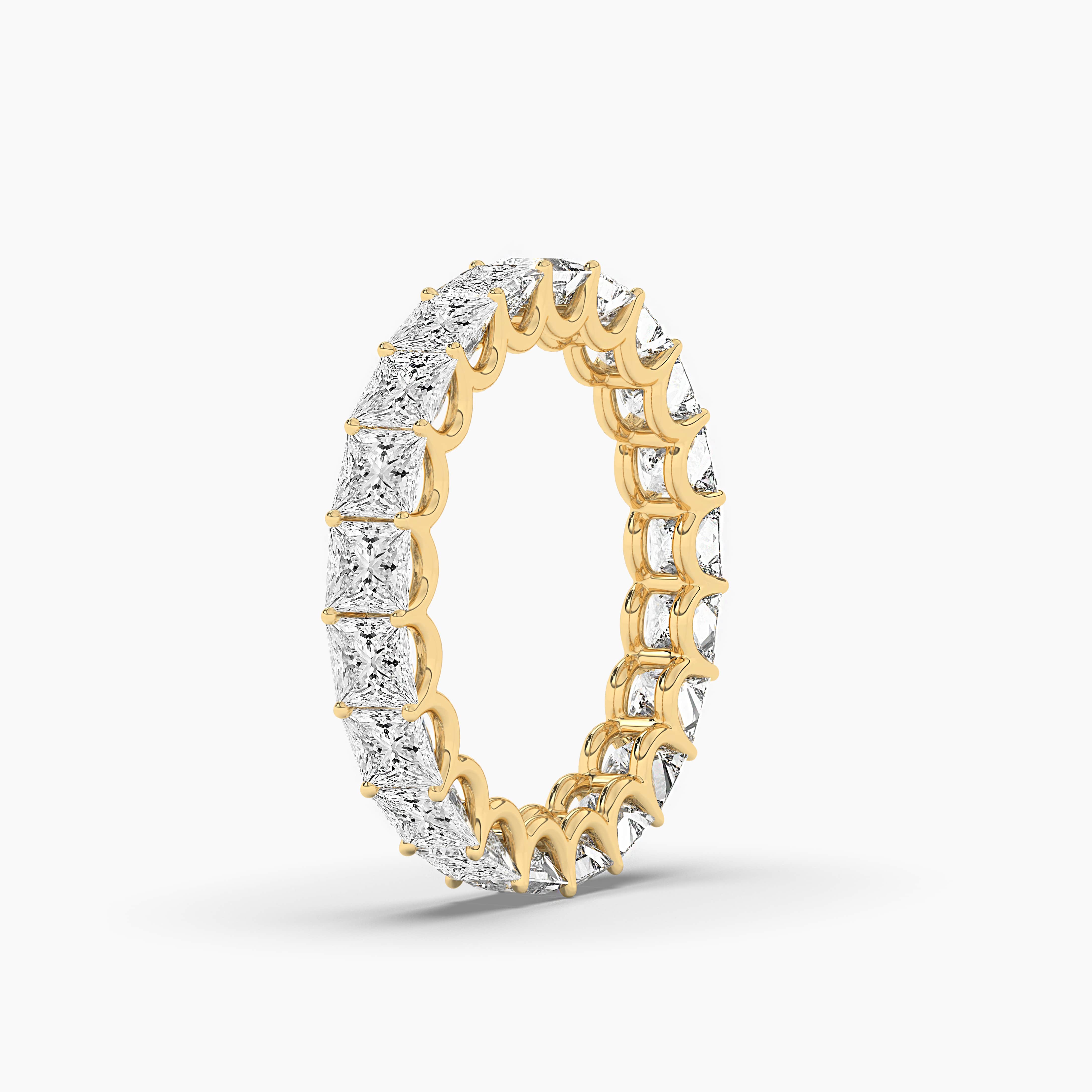 Eternity Ring with Prong Set Princess Cut Diamonds in Yellow Gold