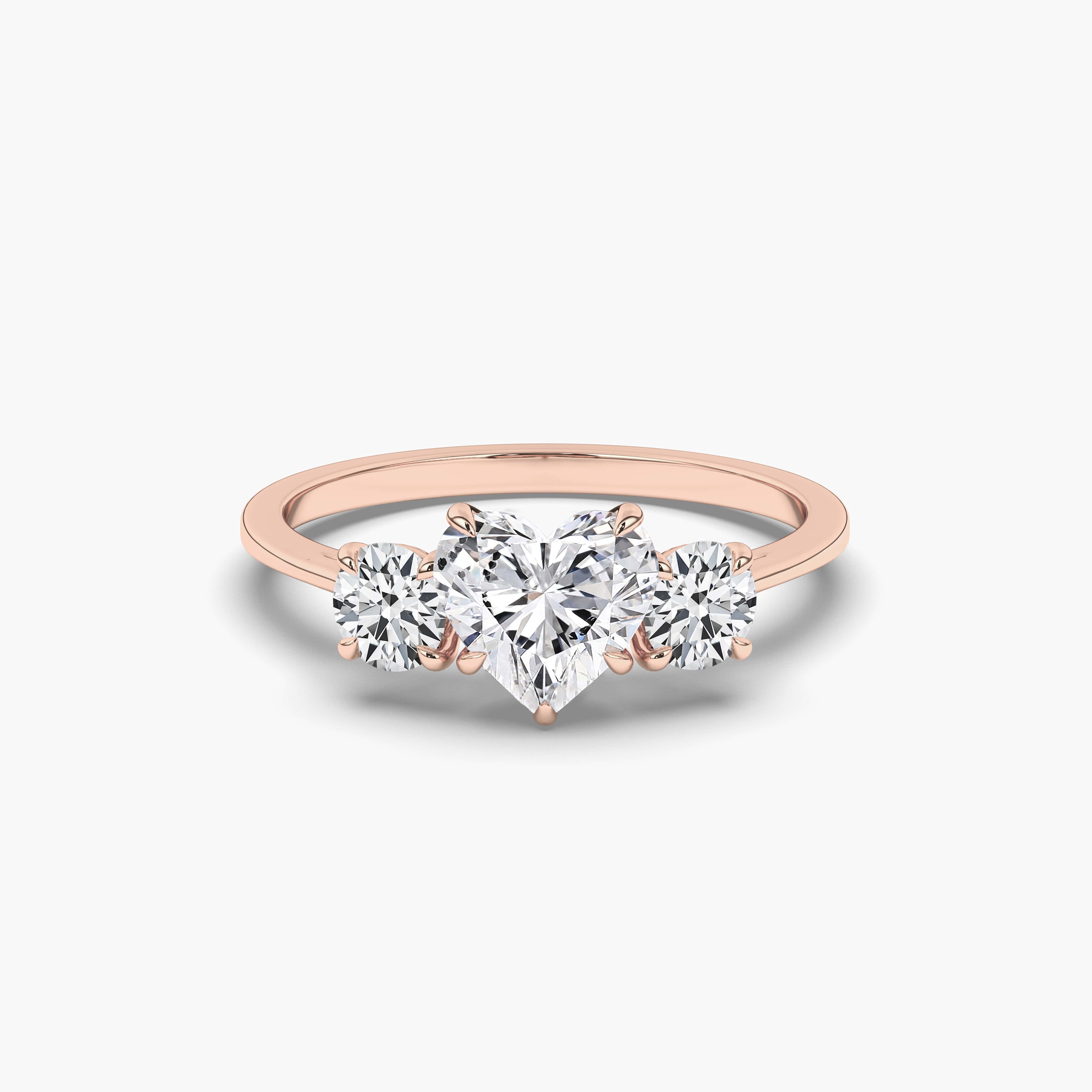 rose gold ring with heart cut solitaire
