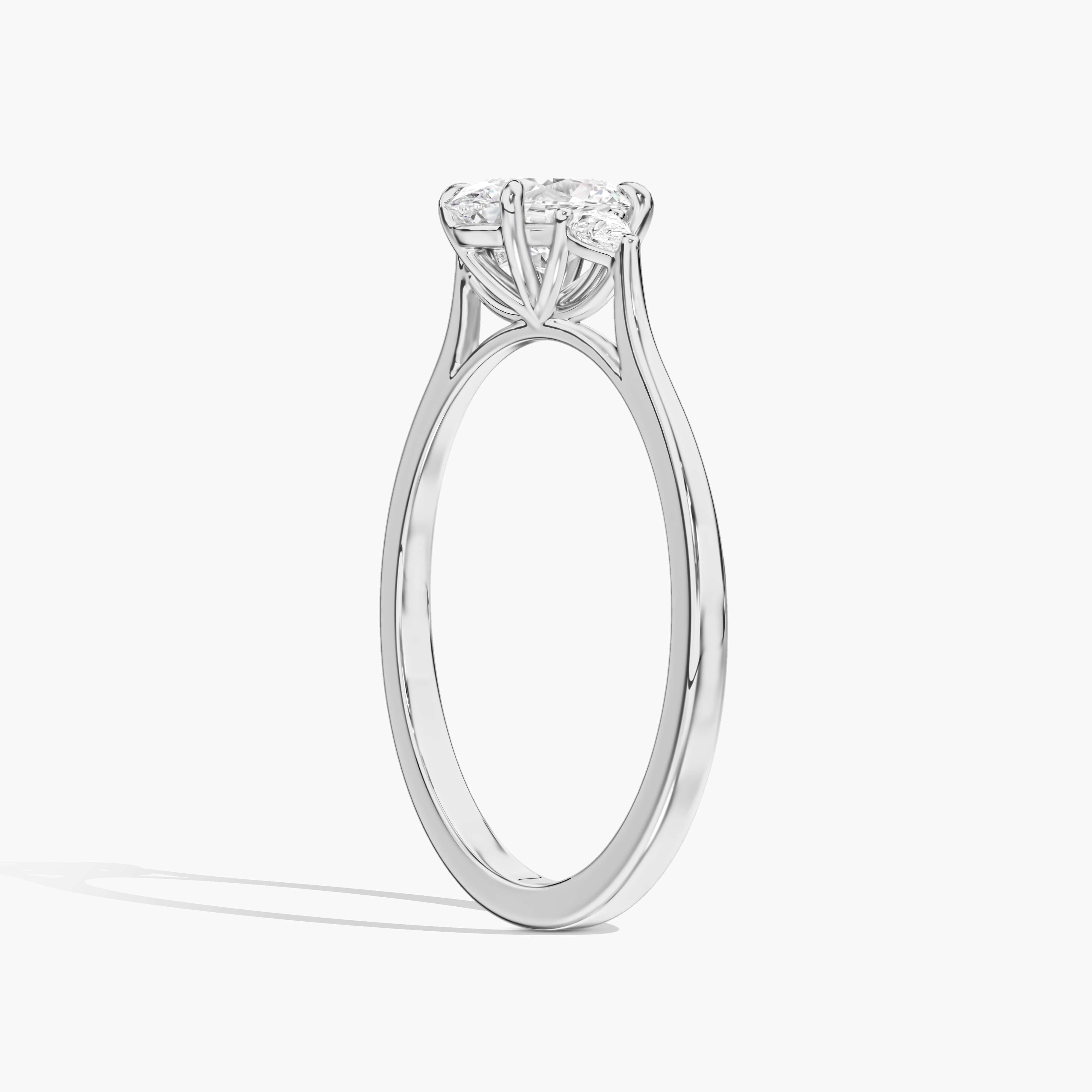 White Gold Three Stone Oval And Pear Diamond Engagement Ring