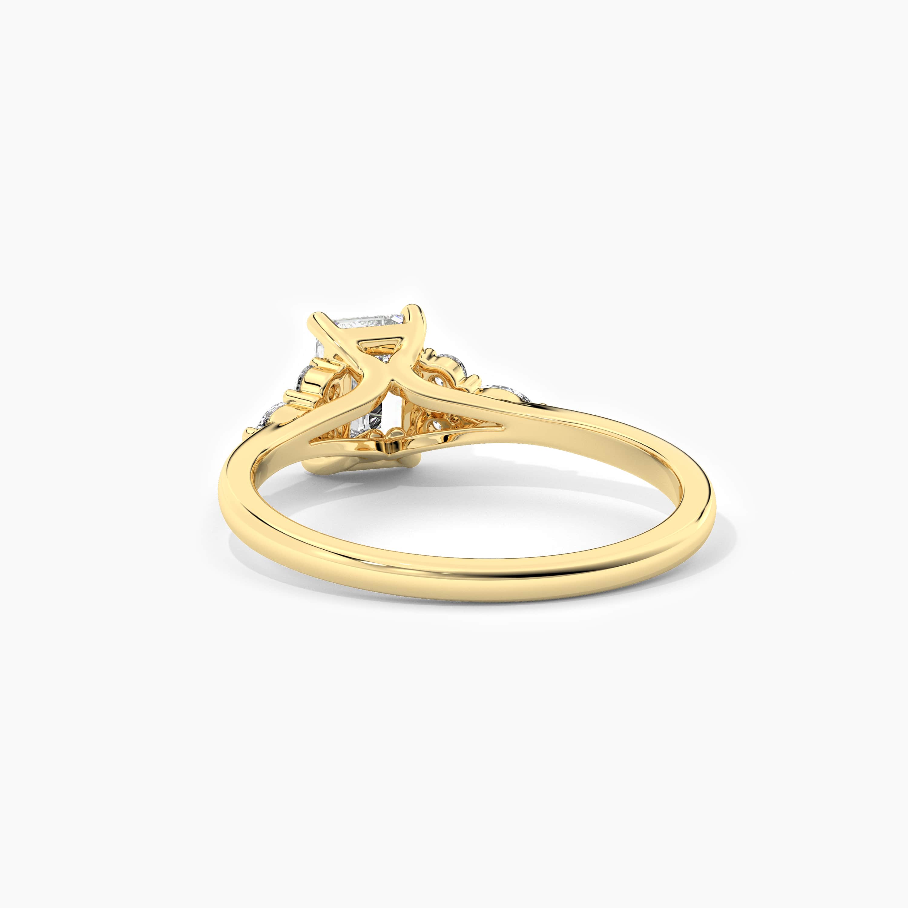 gold emerald cut moissanite diamond ring