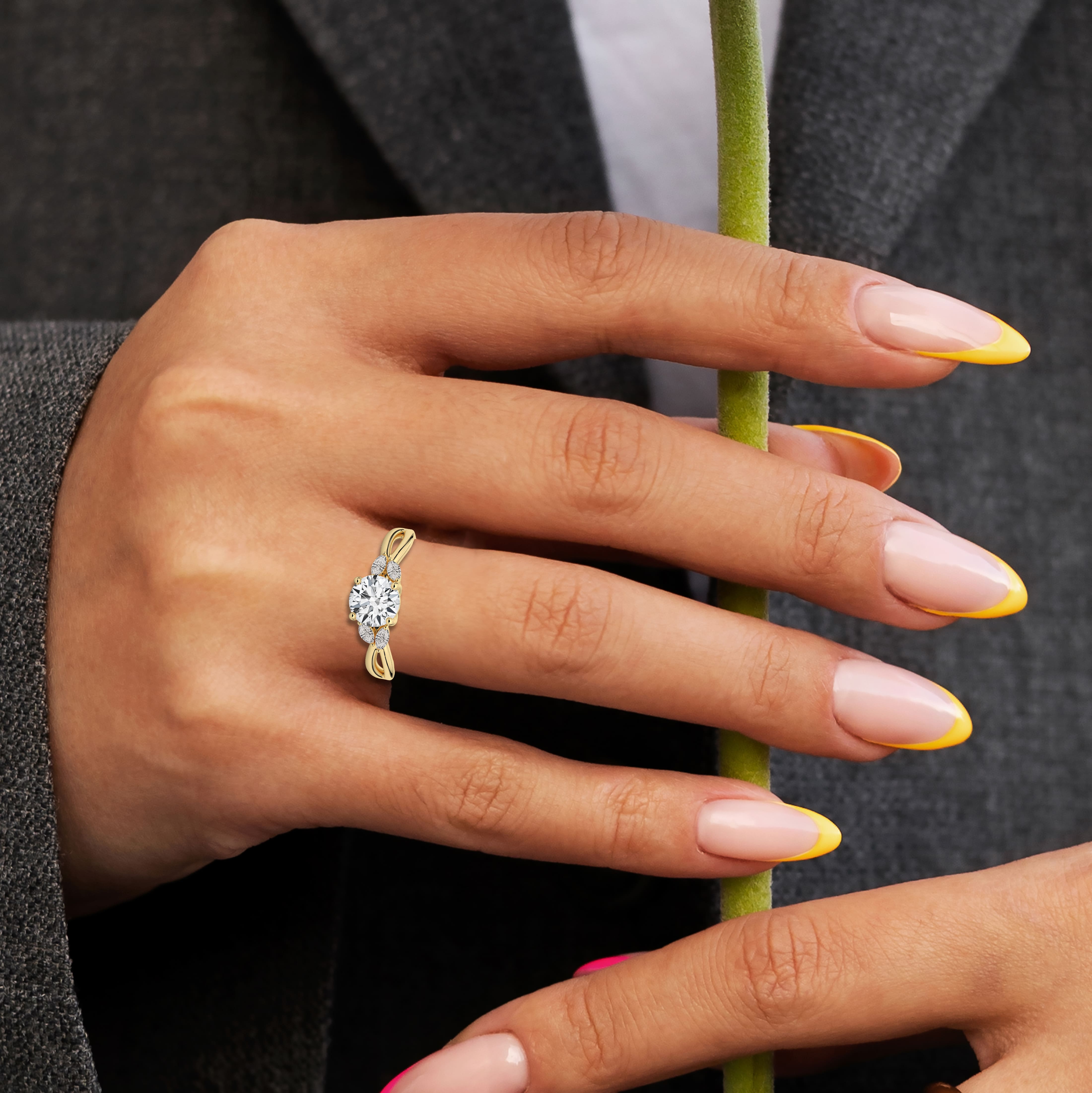 Round Cut Marquise Diamond Engagement Ring In Your Hand