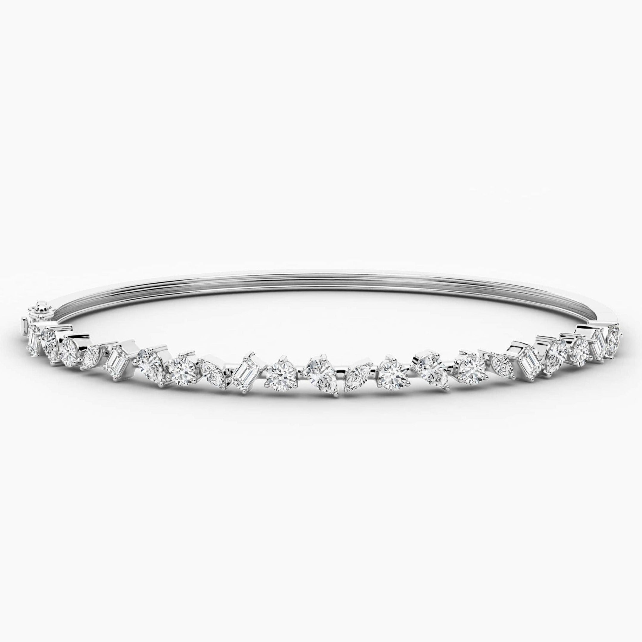 gold and diamond bangle bracelet in white gold