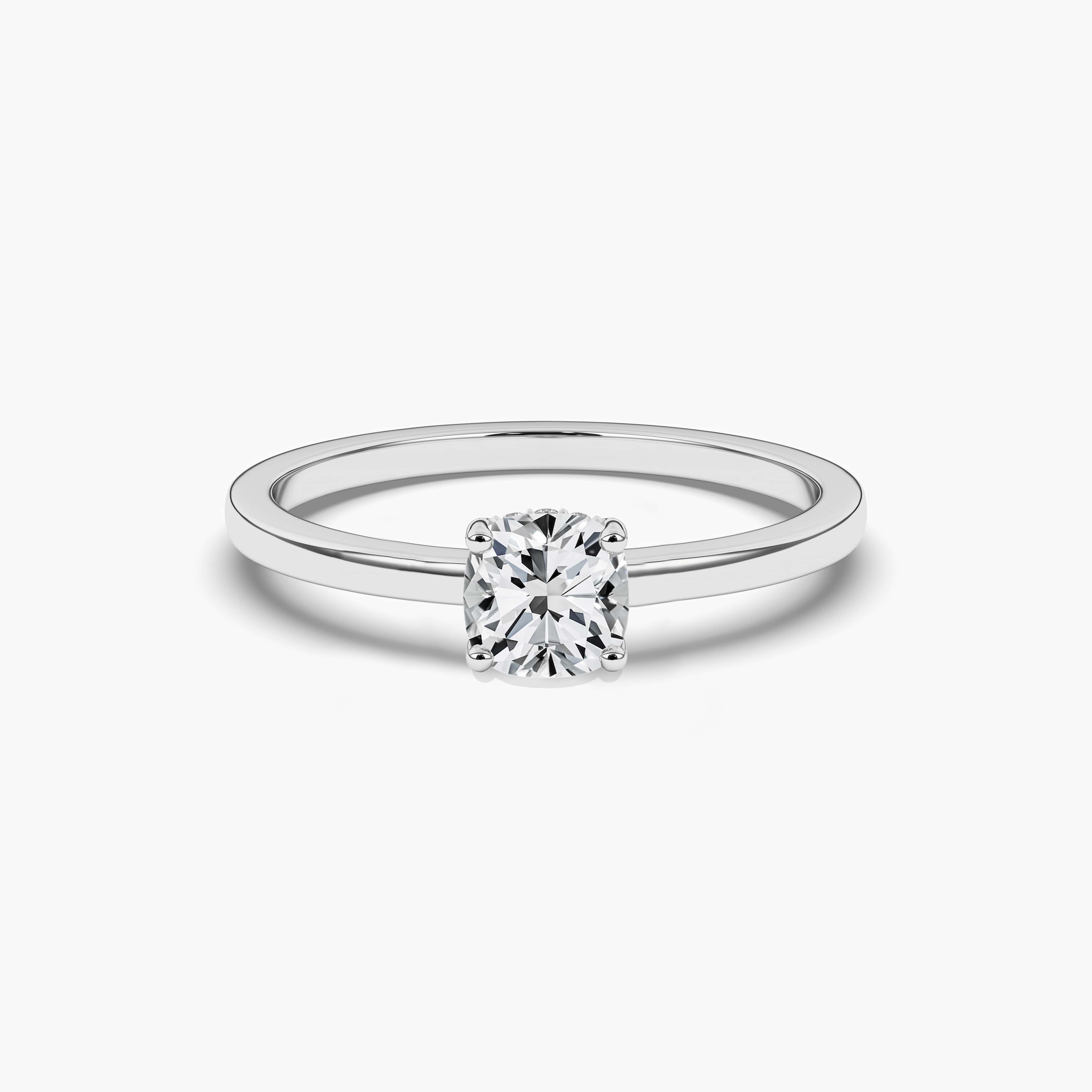 cushion cut hidden halo engagement ring in white gold 