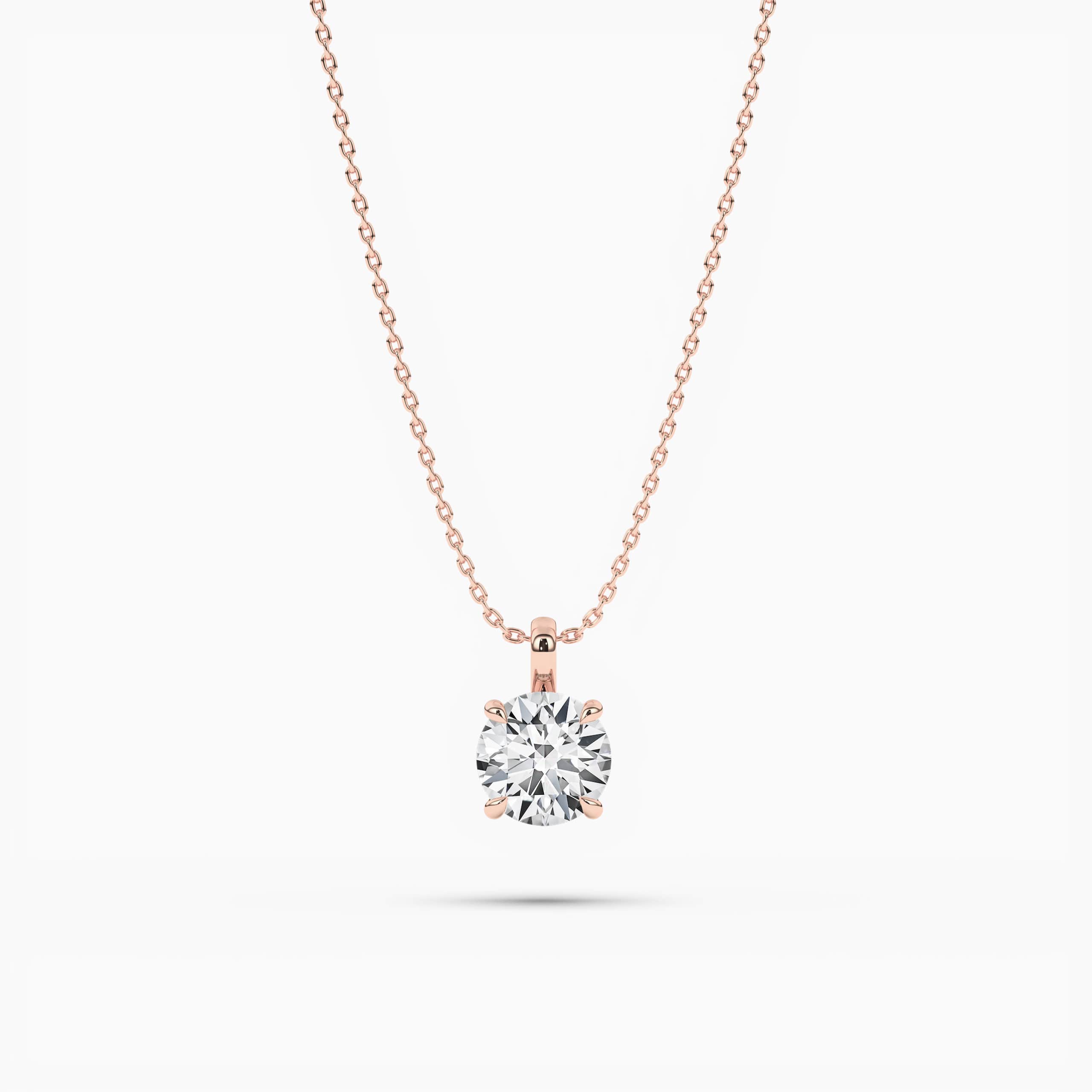 solitaire pendant in Rose  gold with round diamond and four prongs