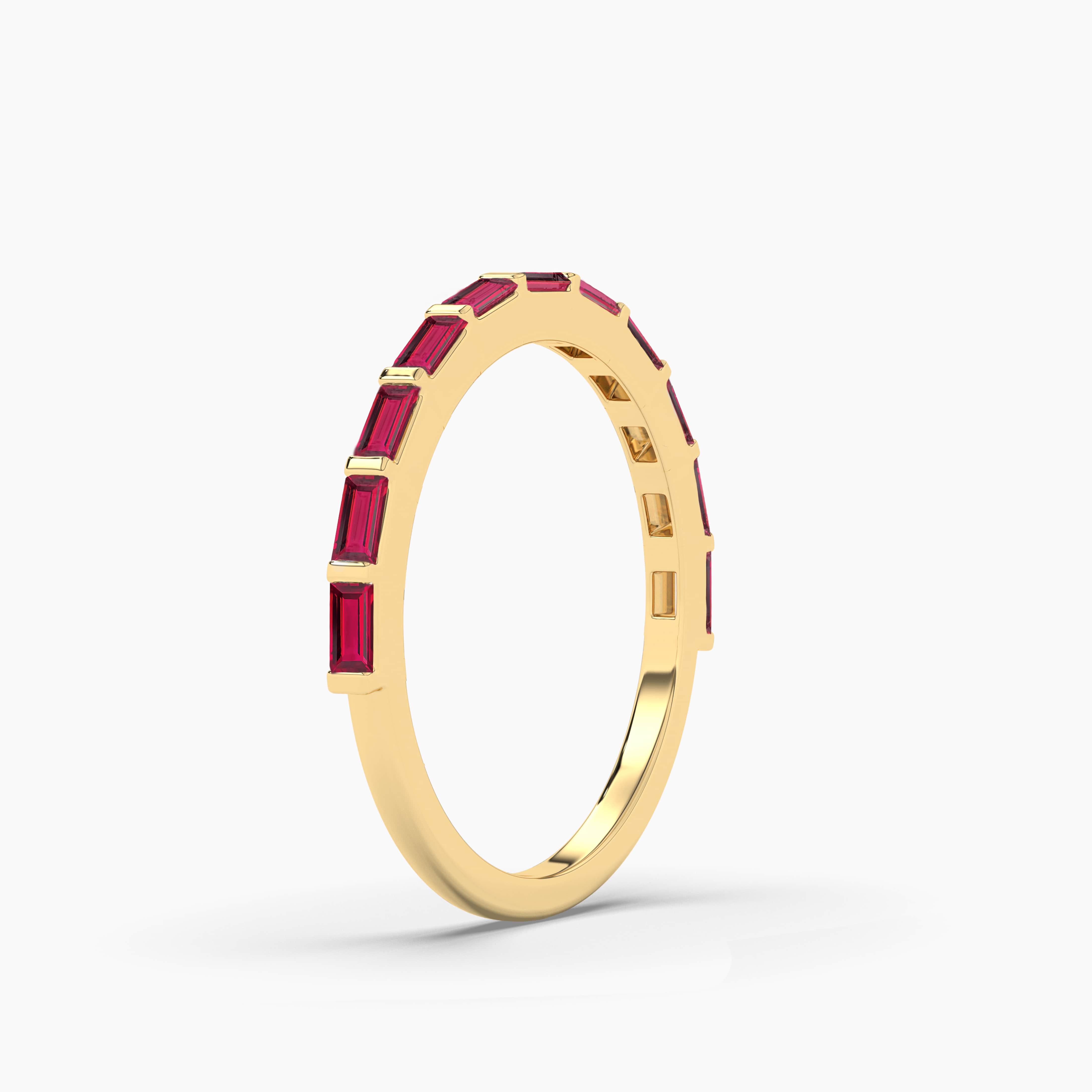 ruby baguette yellow gold half eternity band