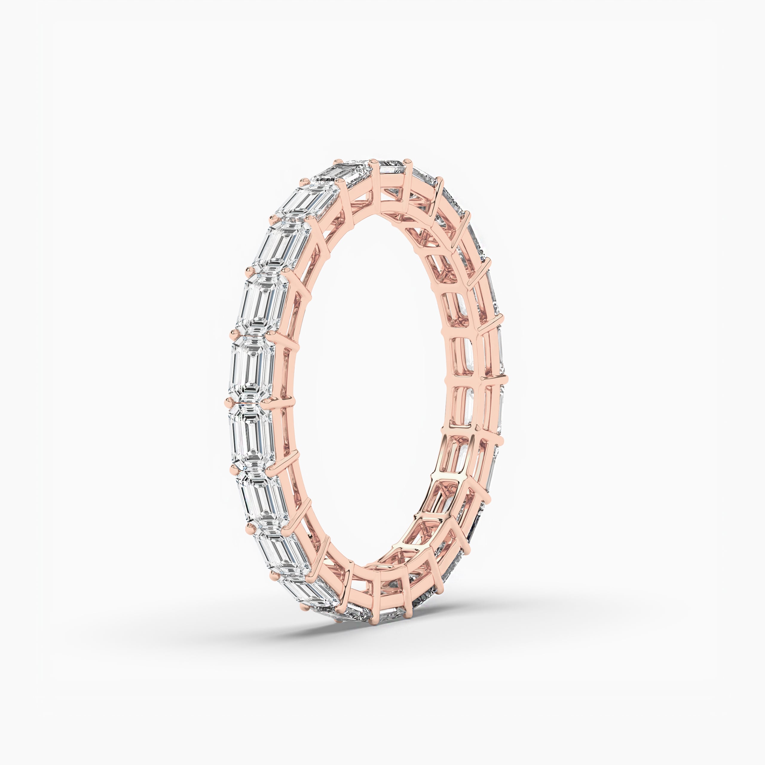 East West Set Emerald Cut Diamond Eternity Ring In Rose Gold