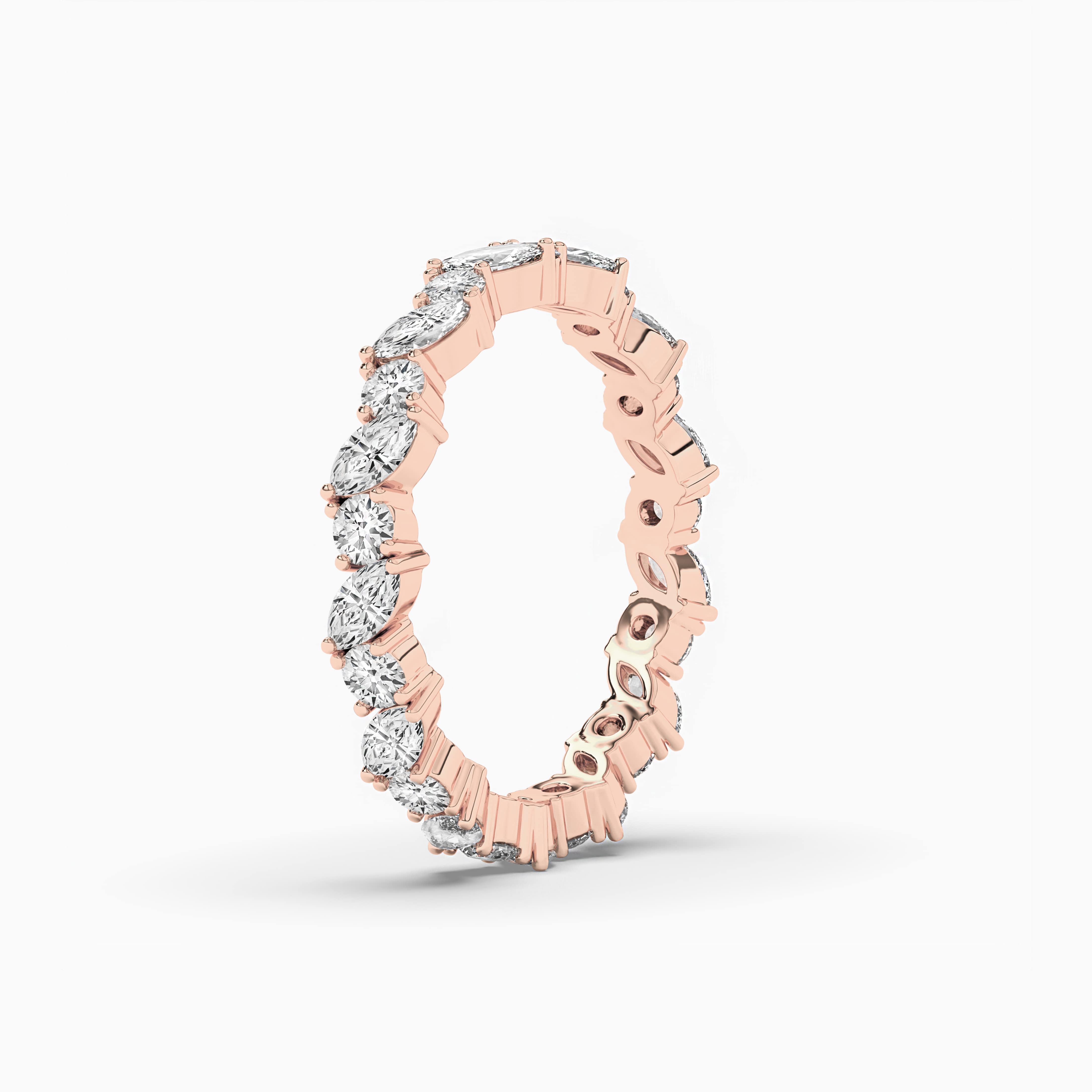 Marquise And Round Cut Multi Stone Eternity Wedding Band In Rose Gold