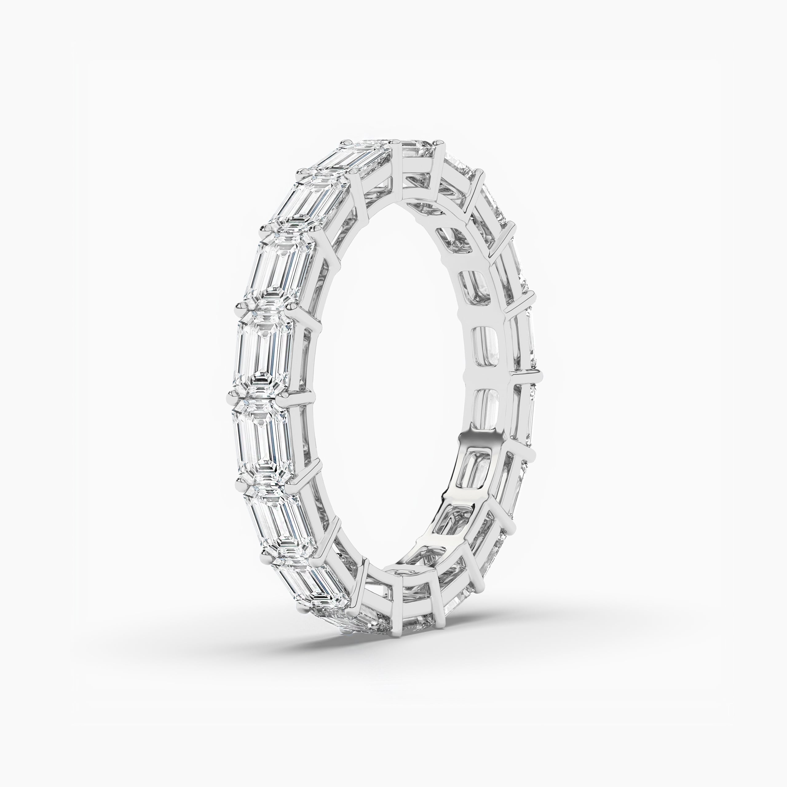 East to West Emerald Cut Eternity In White Gold