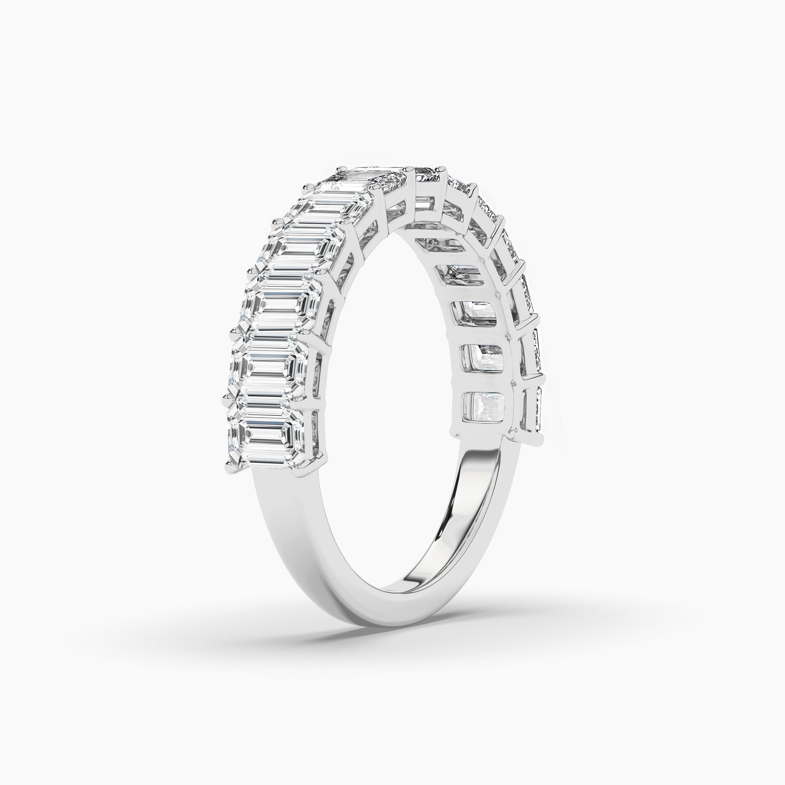 Emerald Cut Diamond Half Eternity Ring In White Gold