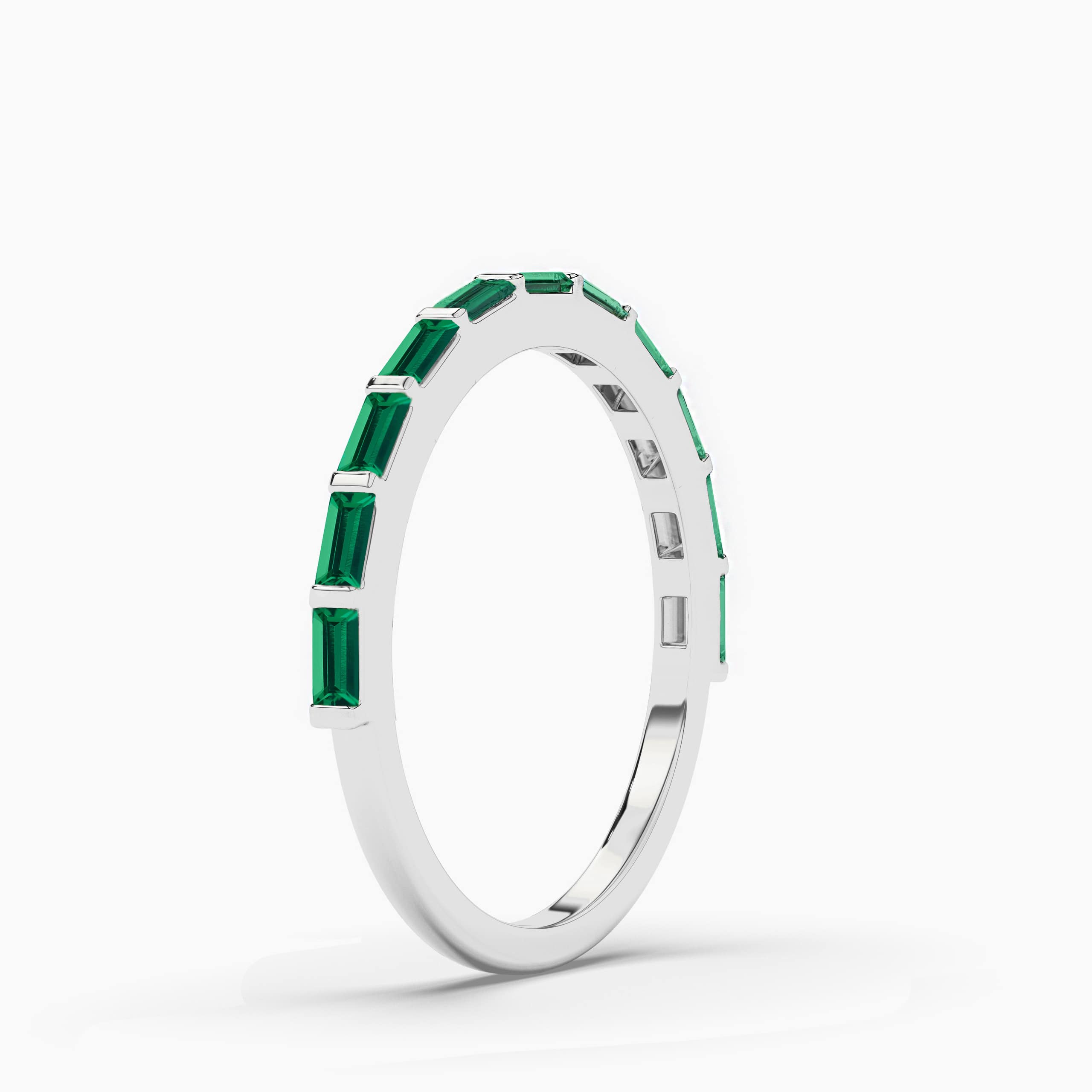 Emerald and Diamond Half Eternity Ring In White Gold