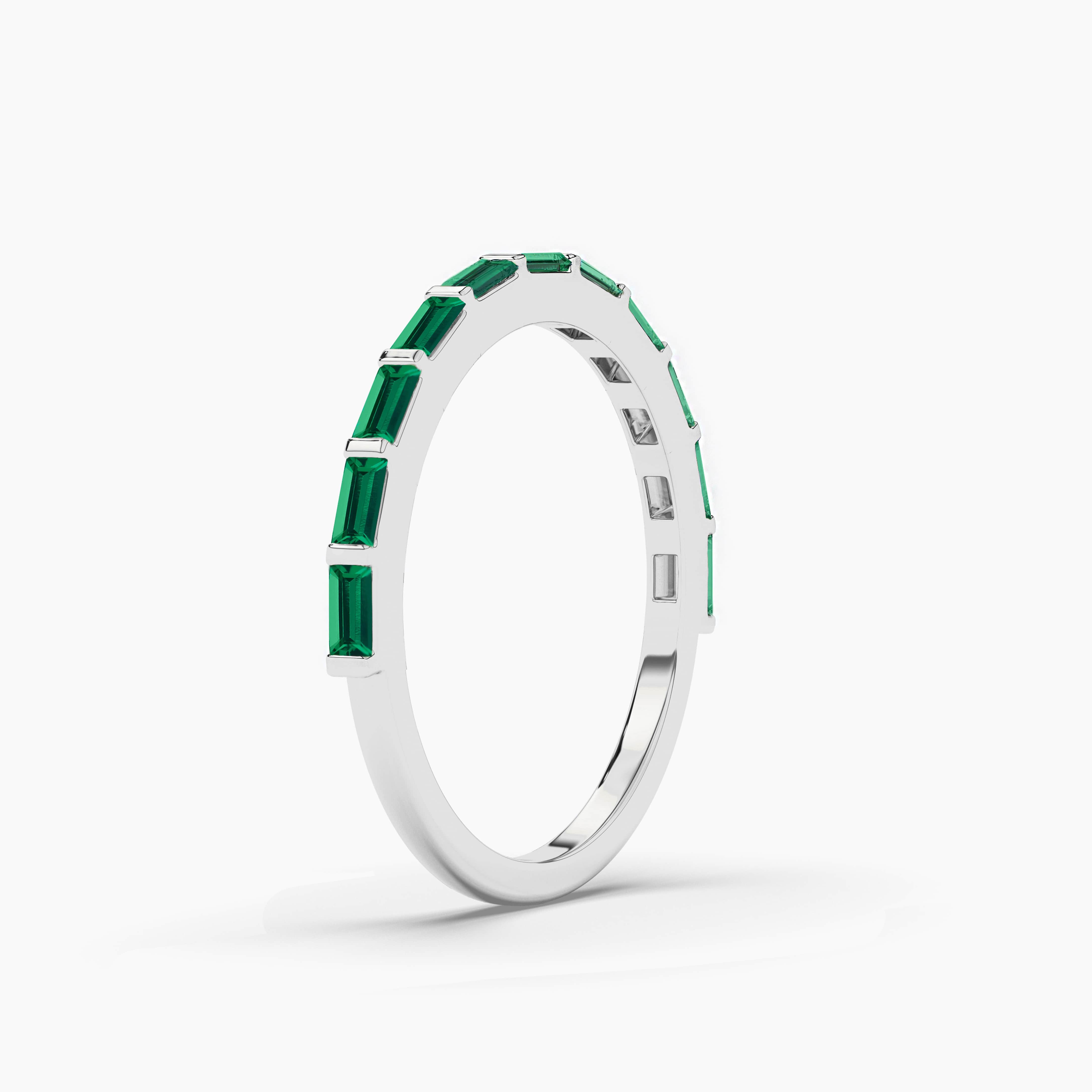 white gold emerald baguette wedding band