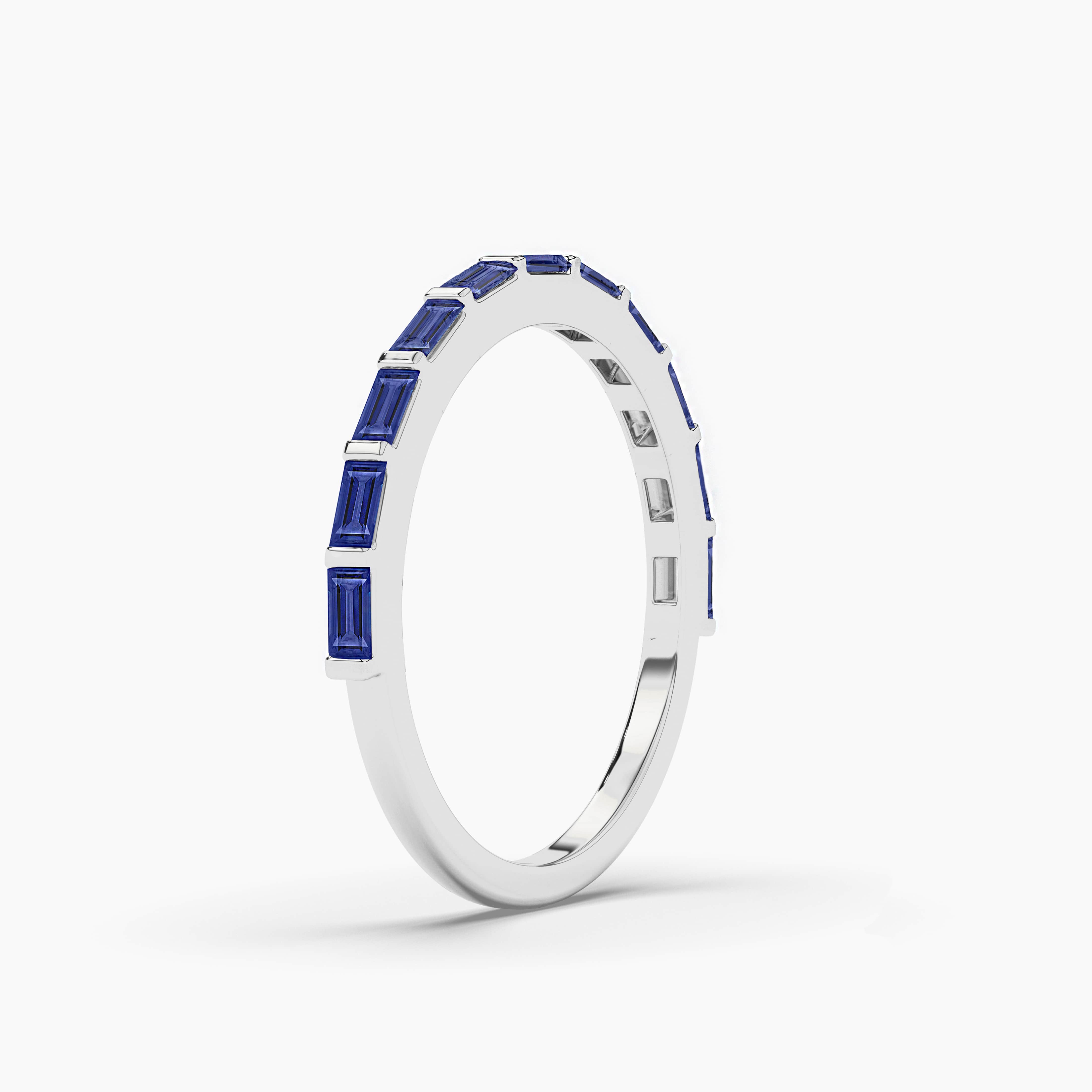 blue sapphire baguette half band in white gold