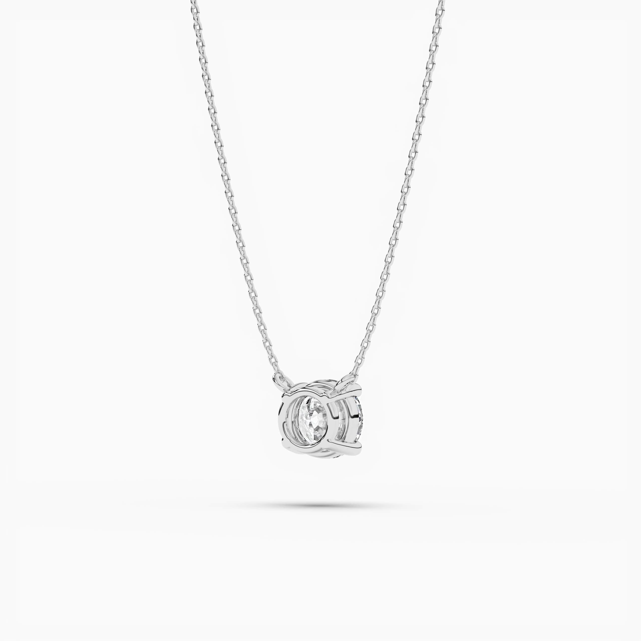 solitaire pendant in white gold with four prongs and round diamonds White Gold