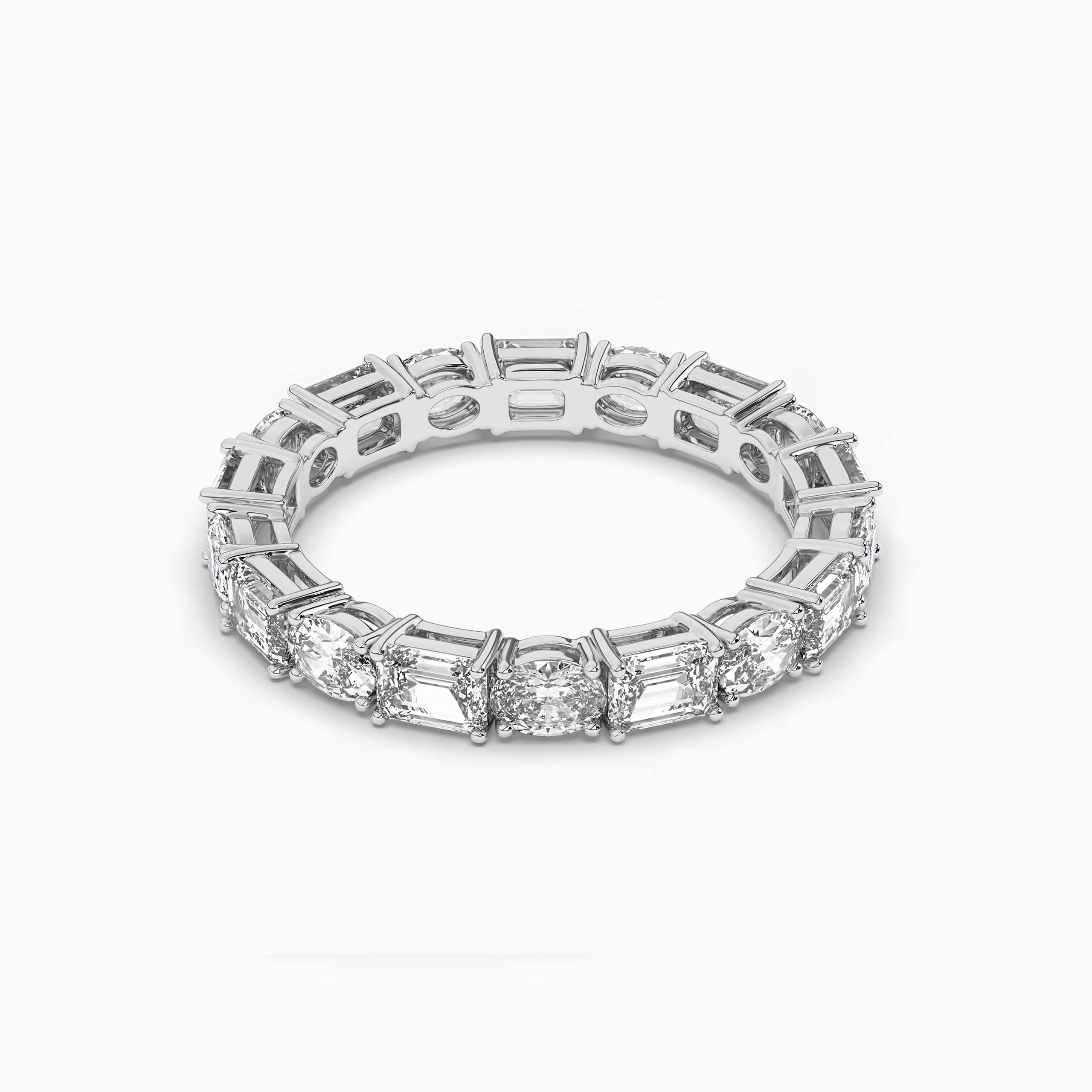 East to West Oval & Emerald Cut Diamond Band In White Gold