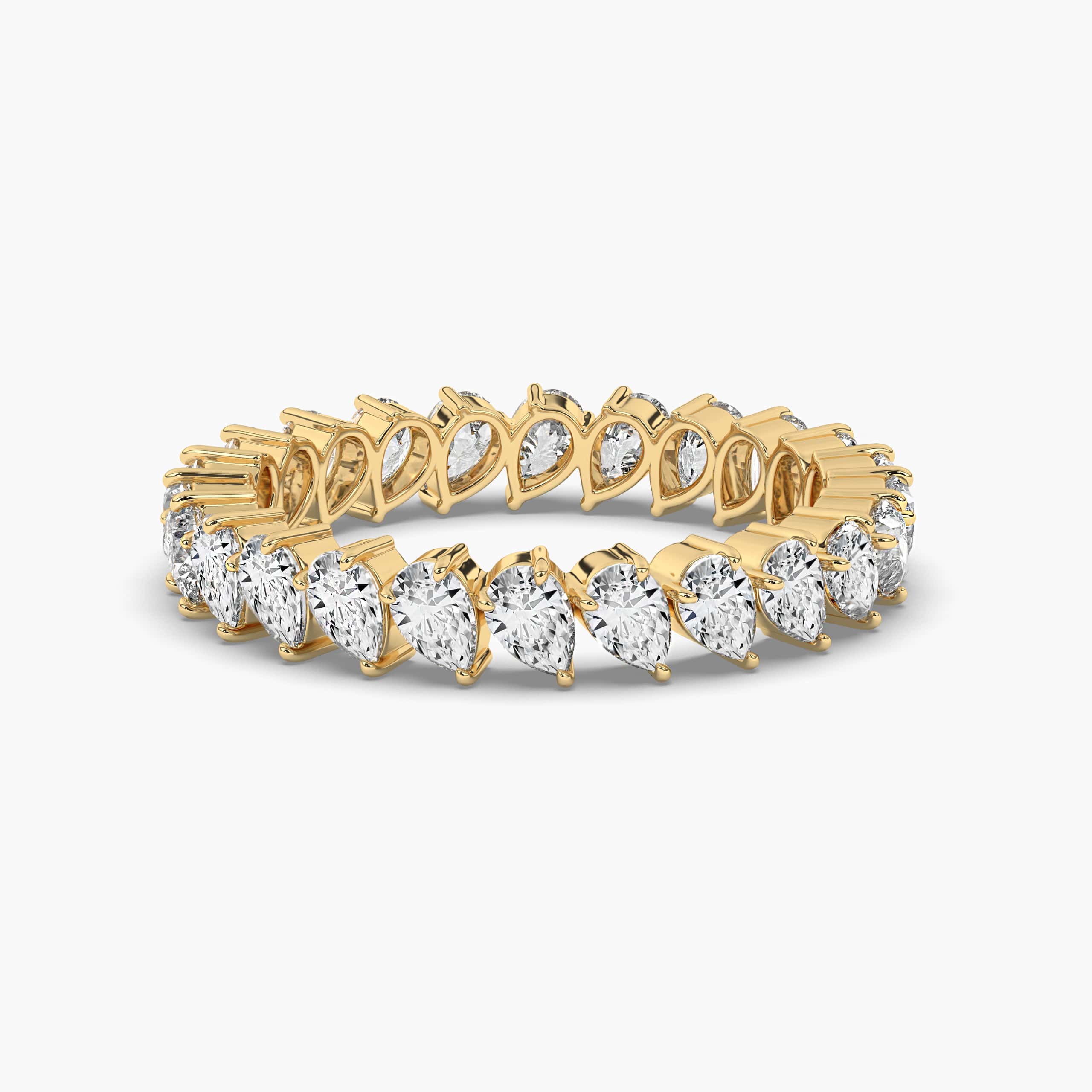 yellow gold pear cut diamond band 