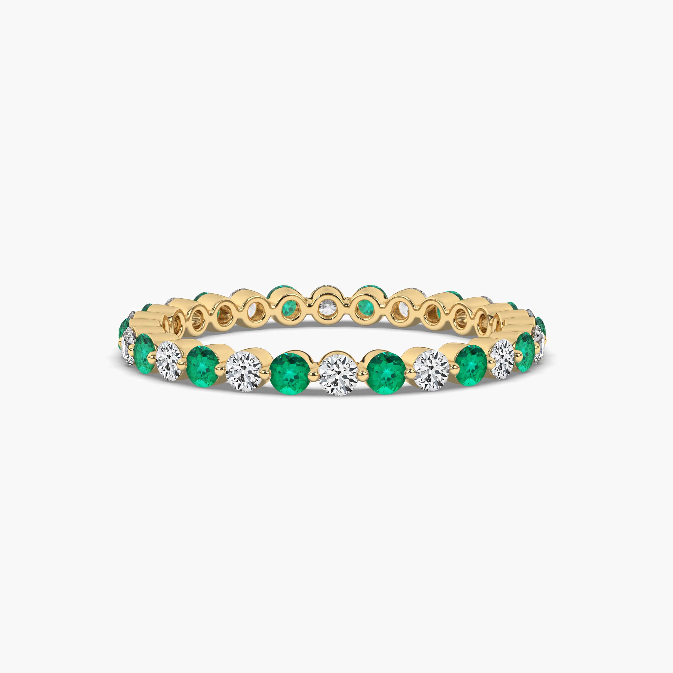 ROUND CUT DIAMOND AND EMERALD ETERNITY WEDDING BAND IN YELLOW GOLD