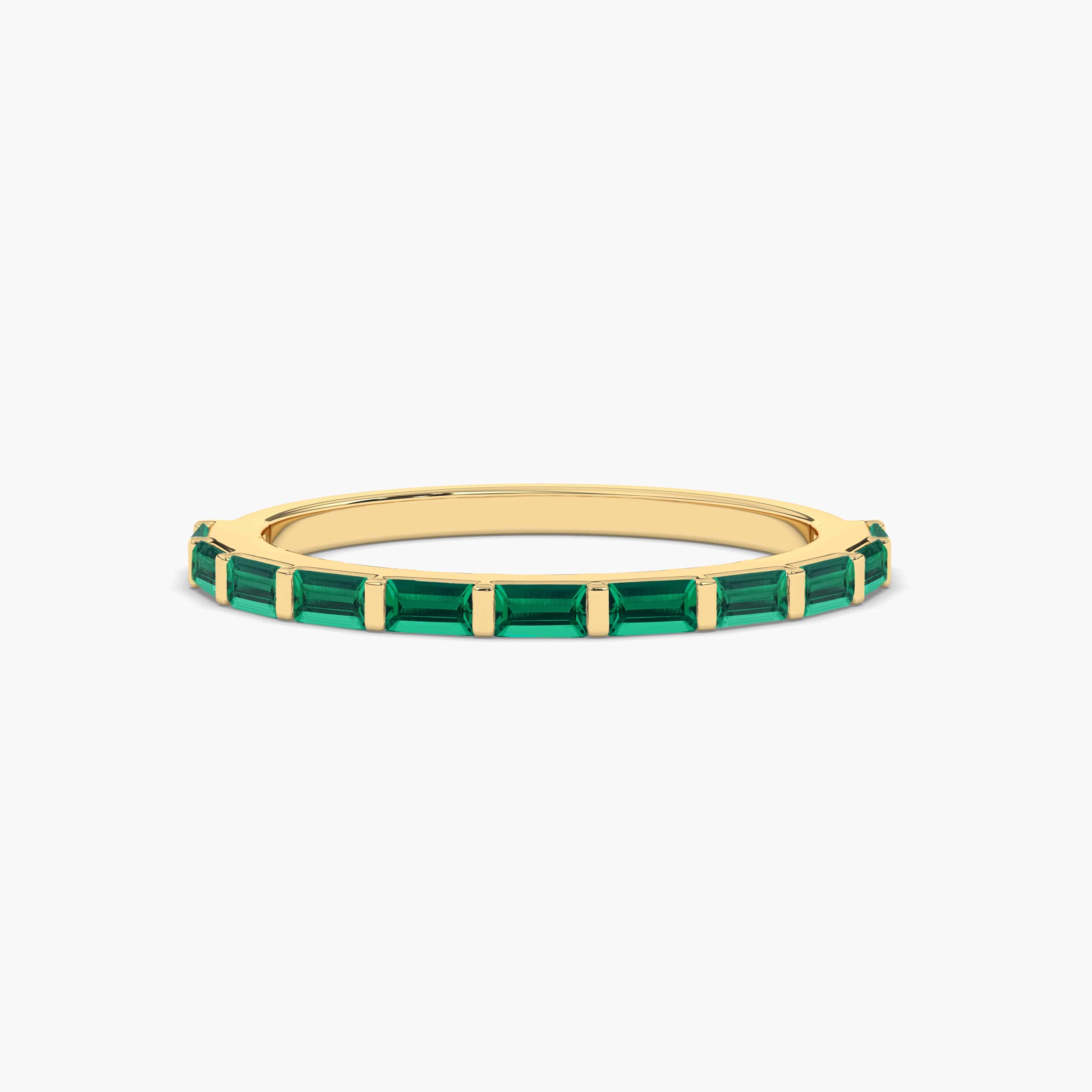 BAGUETTE-CUT EMERALD RING IN YELLOW GOLD 