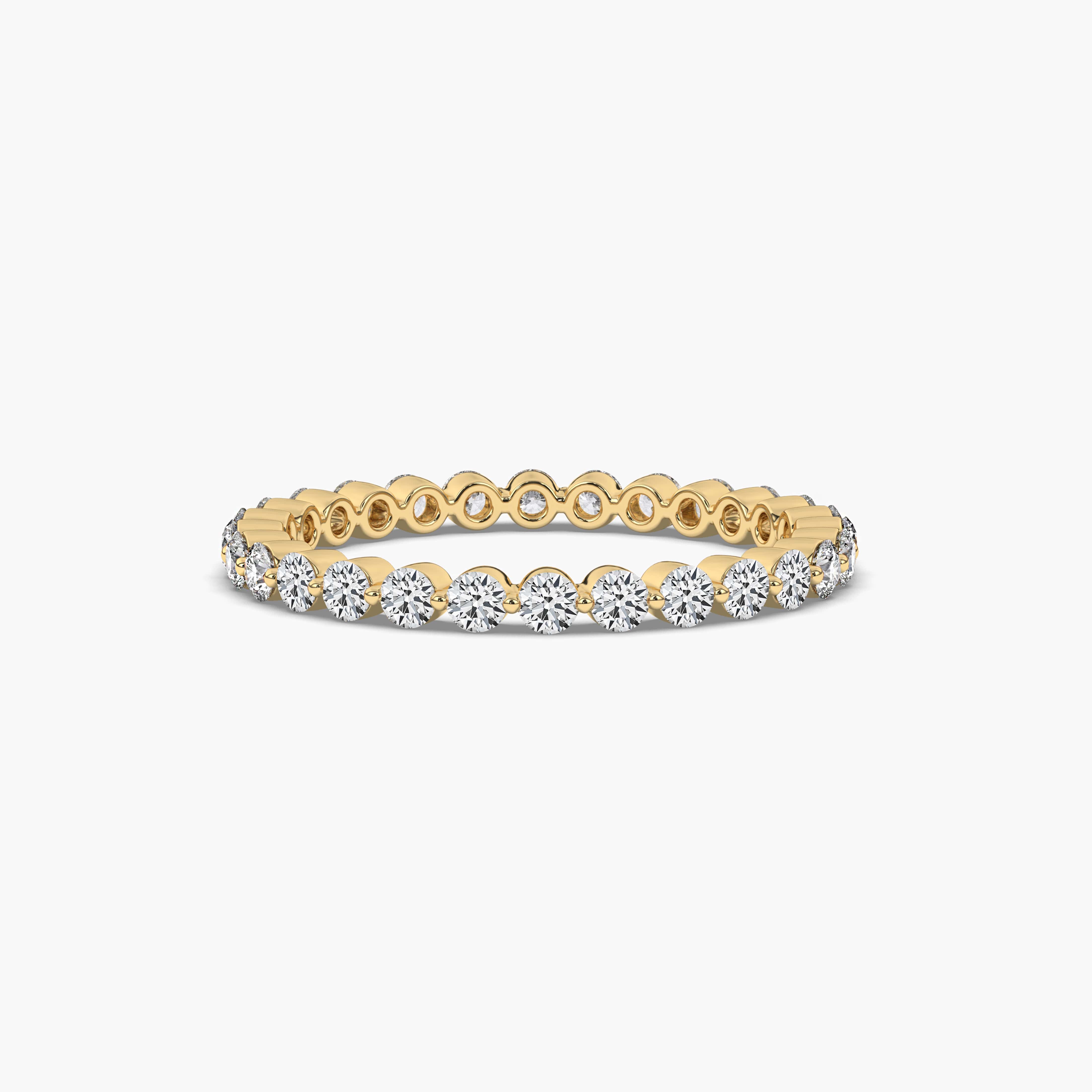 ROUND SHAPE BAR SETTING MOISSANITE ETERNITY BAND IN YELLOW GOLD