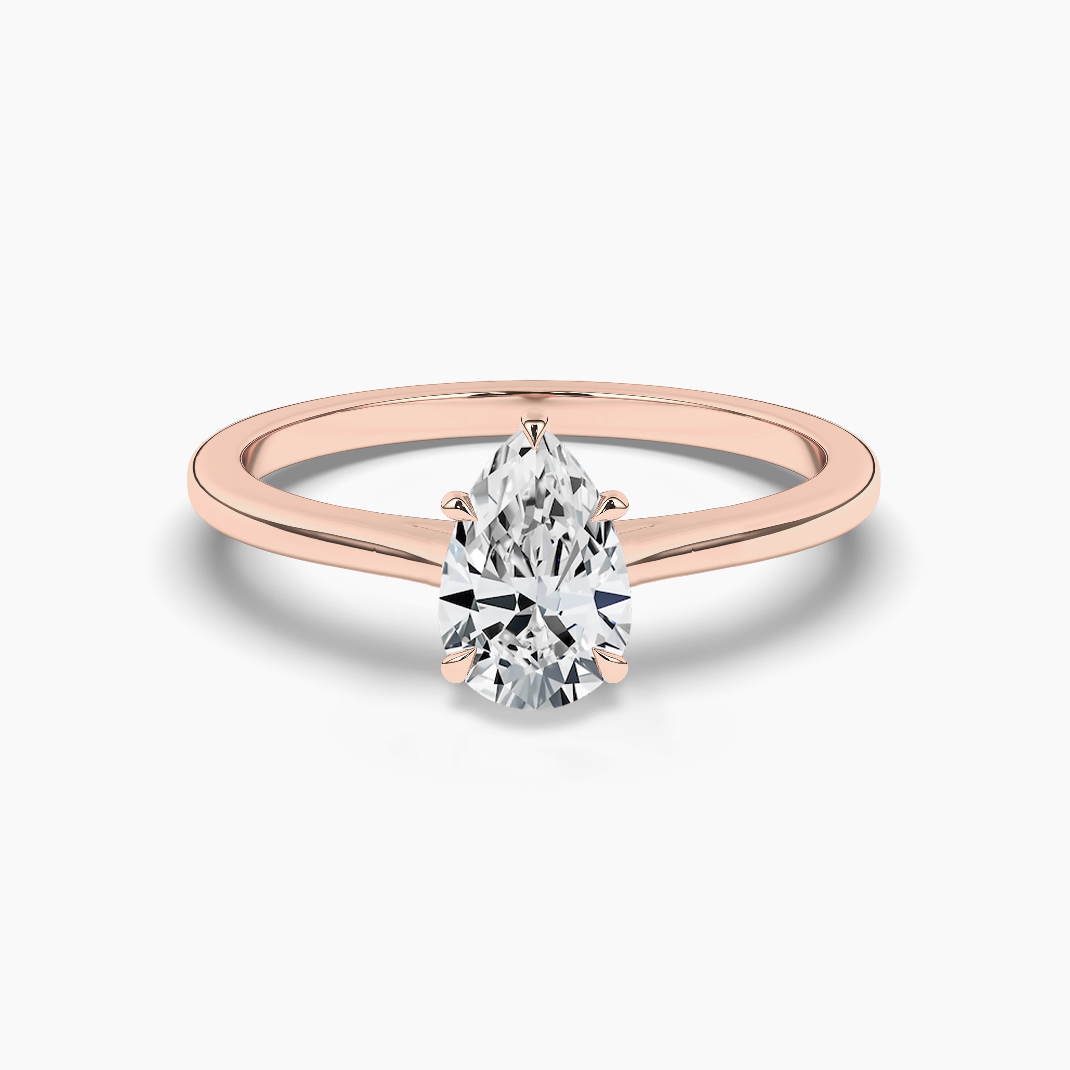 Pear Shaped diamond Solitaire Engagement Rings in Rose Gold