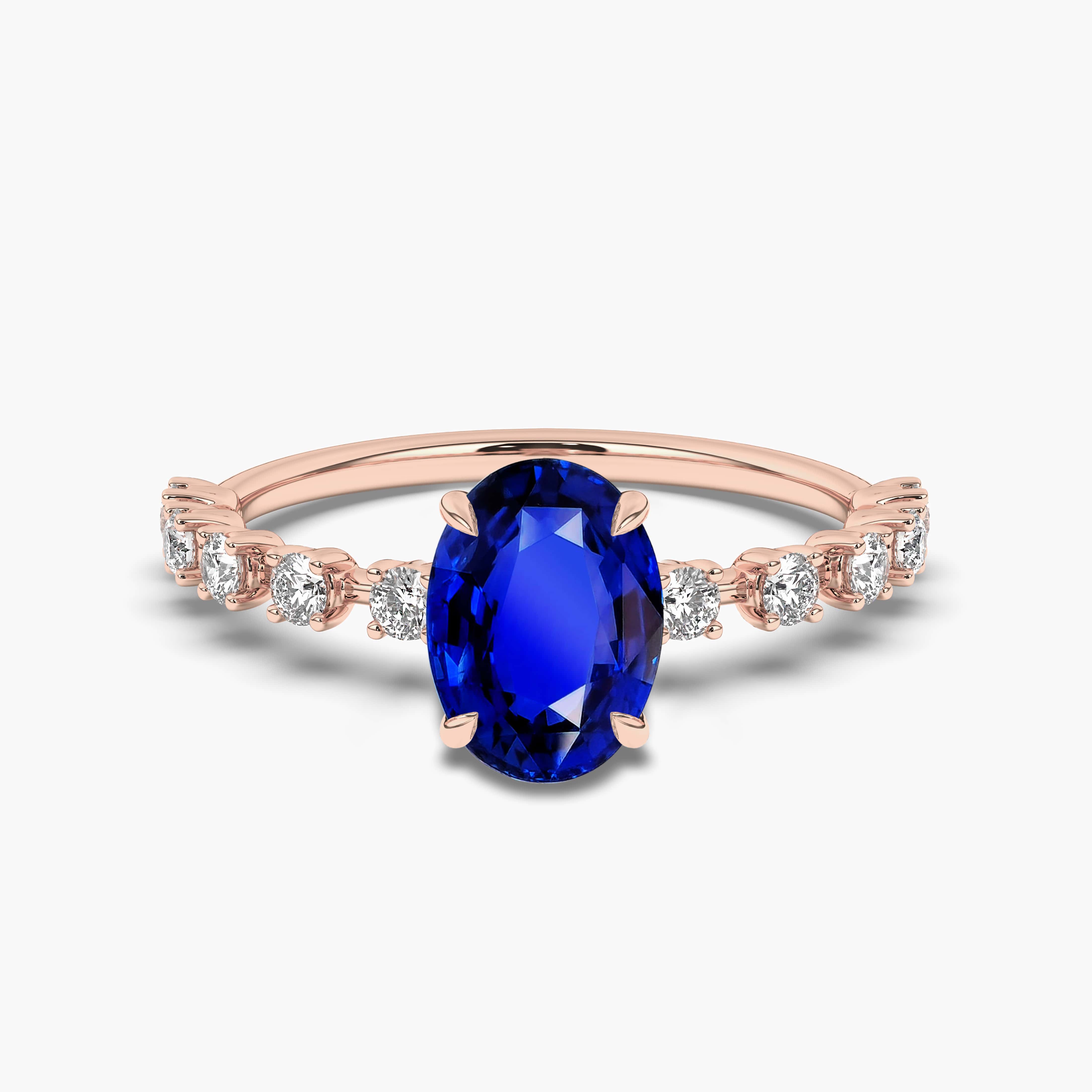 Rose Gold Claw Set Oval Blue Sapphire And Diamond Ring