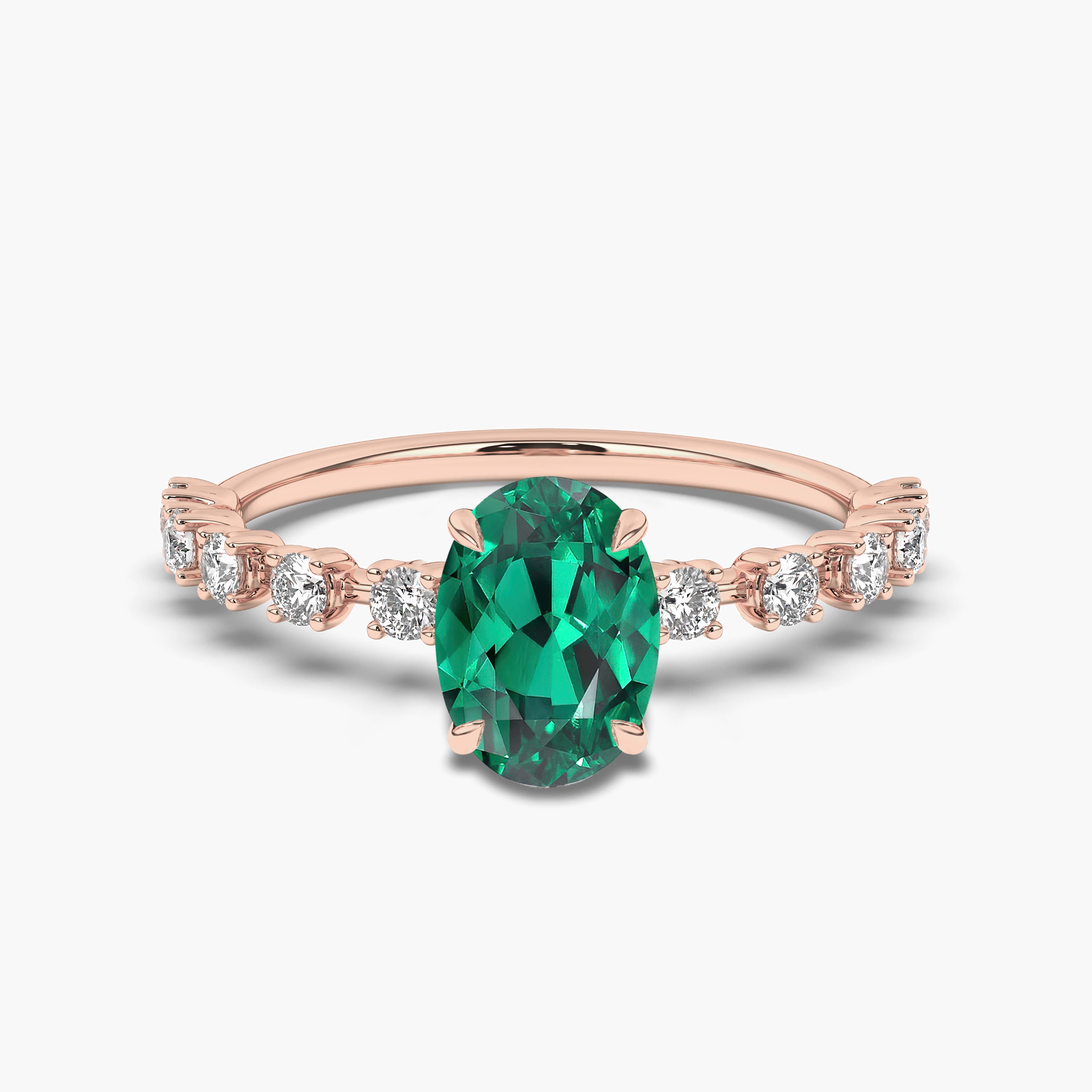 Oval Cut Emerald Engagement Ring In Rose Gold