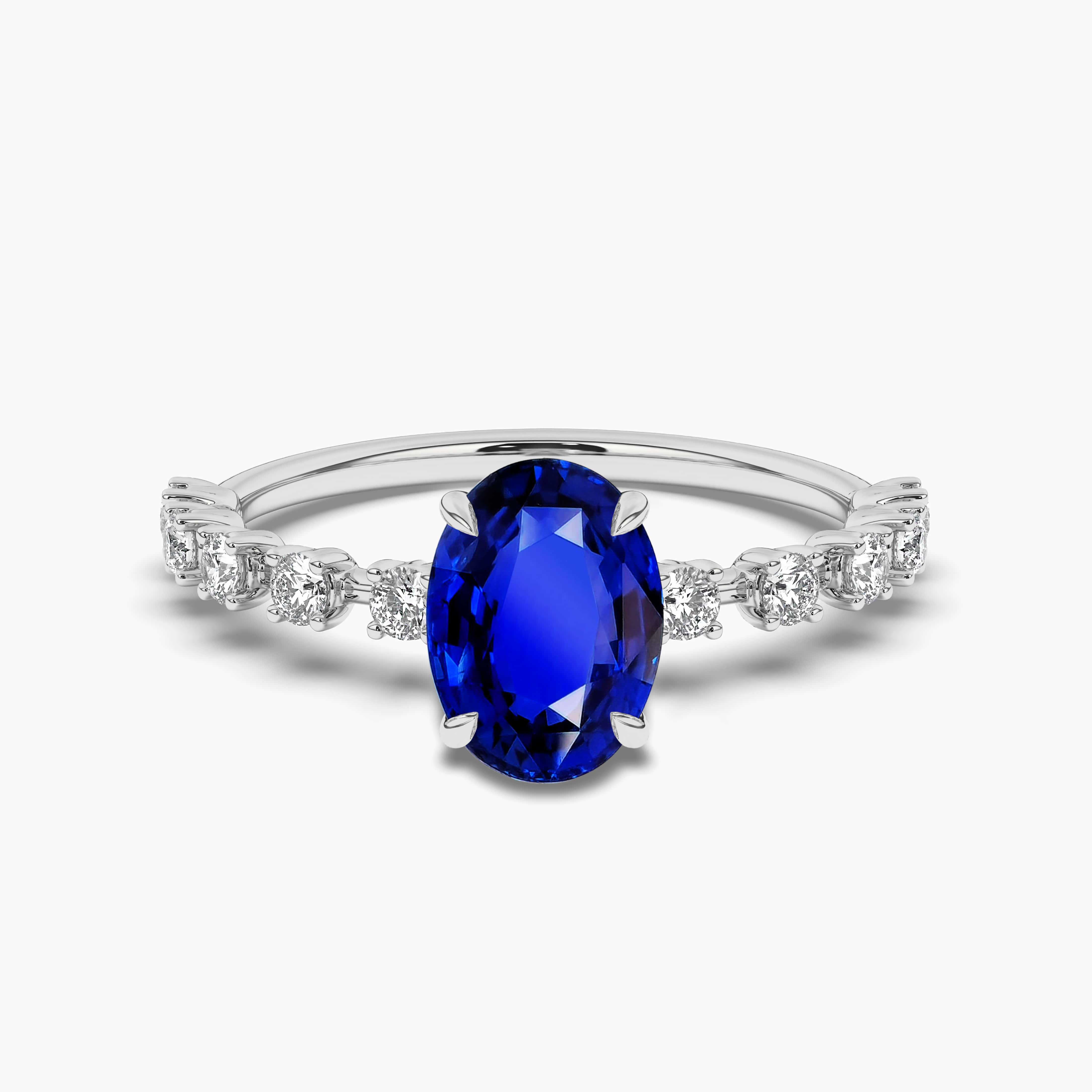 Oval Blue Sapphire Engagement Ring In White Gold