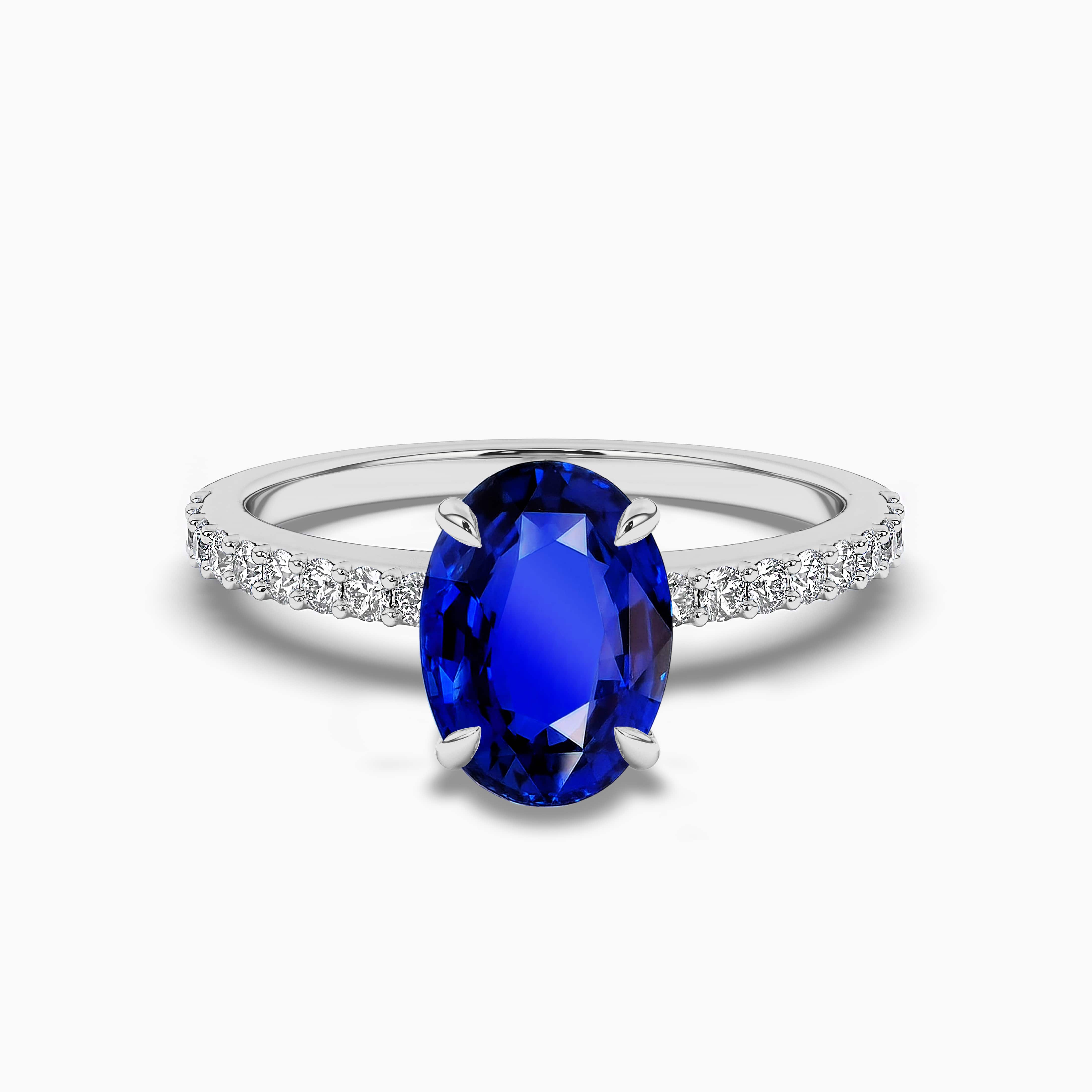 Oval Cut Blue Sapphire and Diamond Ring Unique Design In White Gold