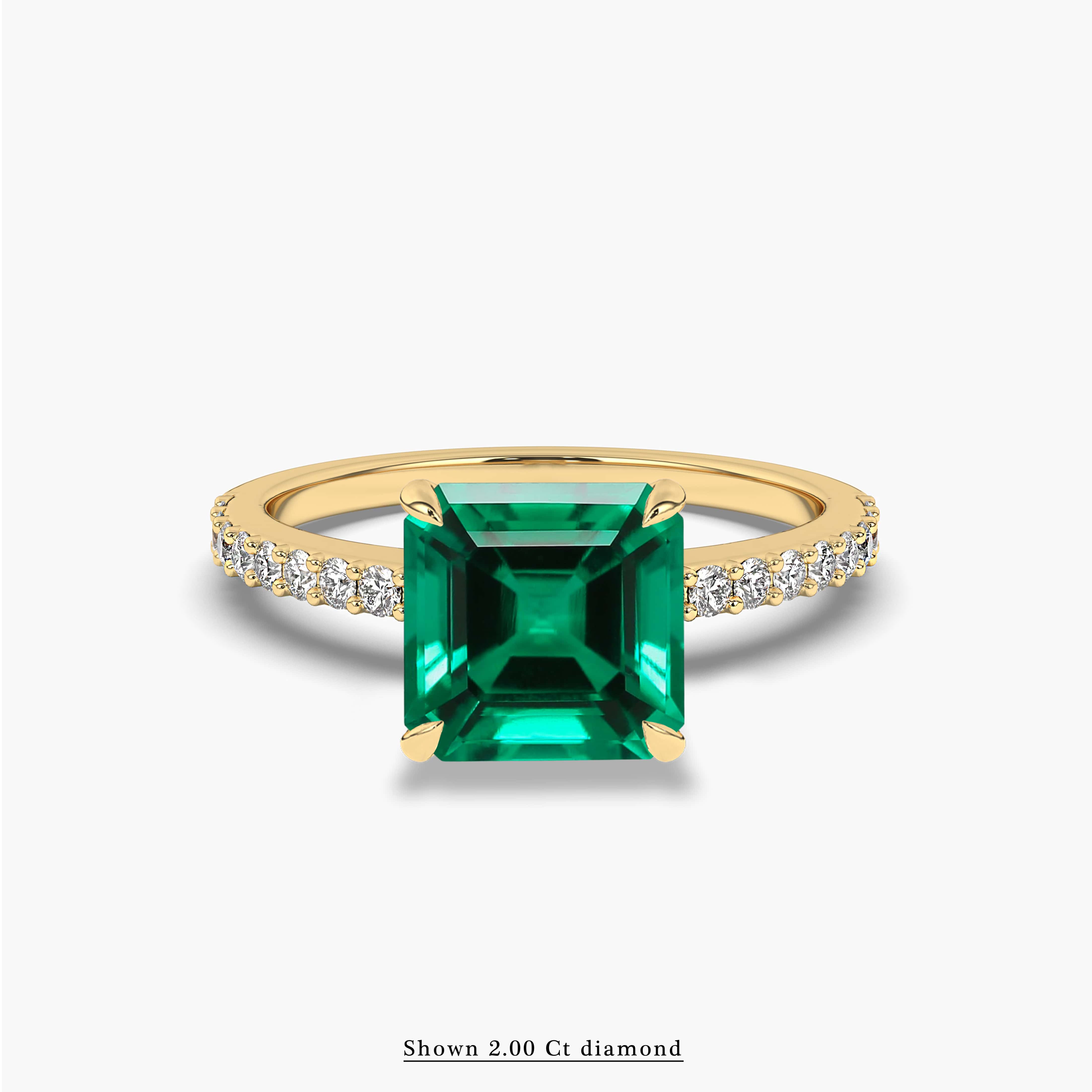 green emerald and diamond engagement rings​