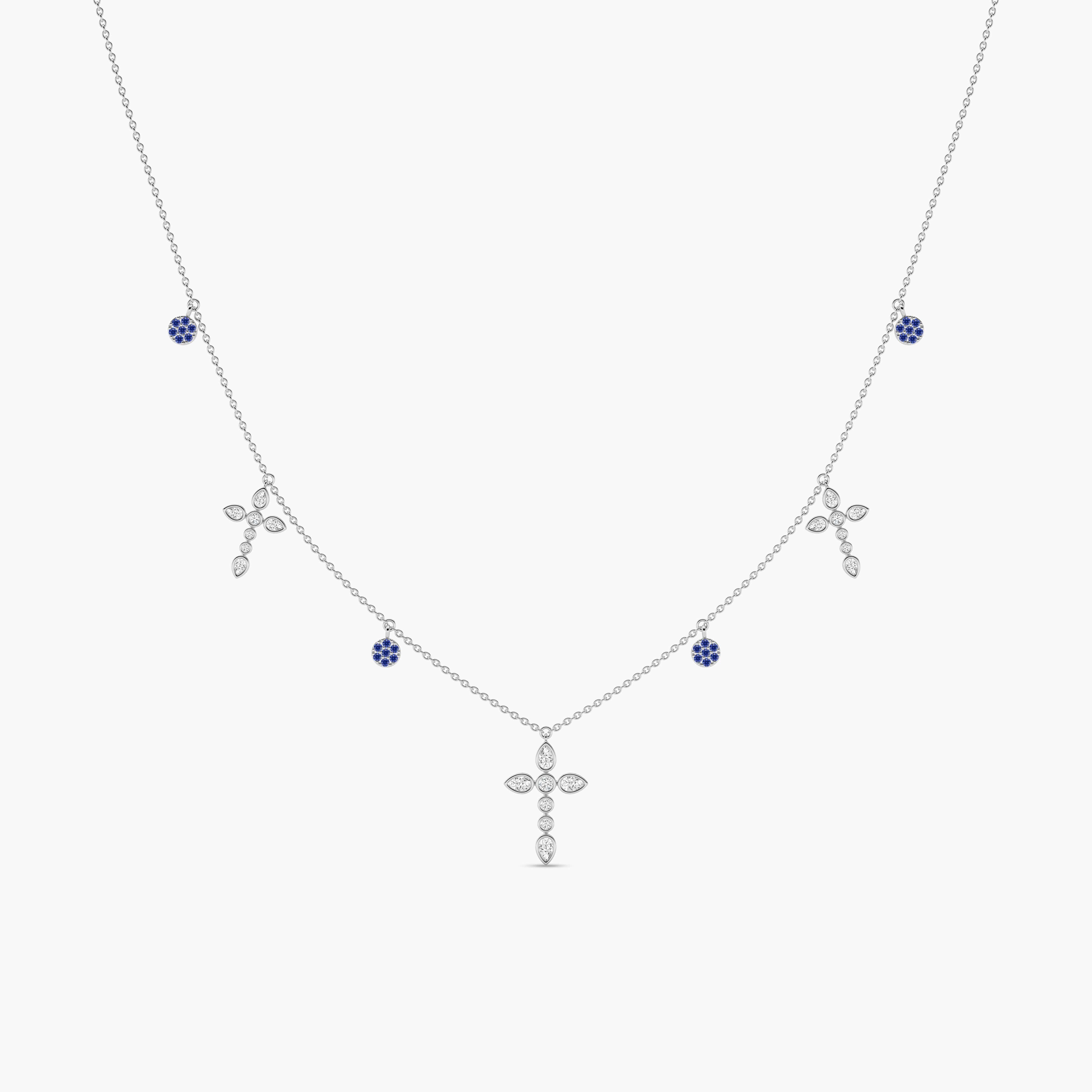 blue sapphire and diamond cross necklace​