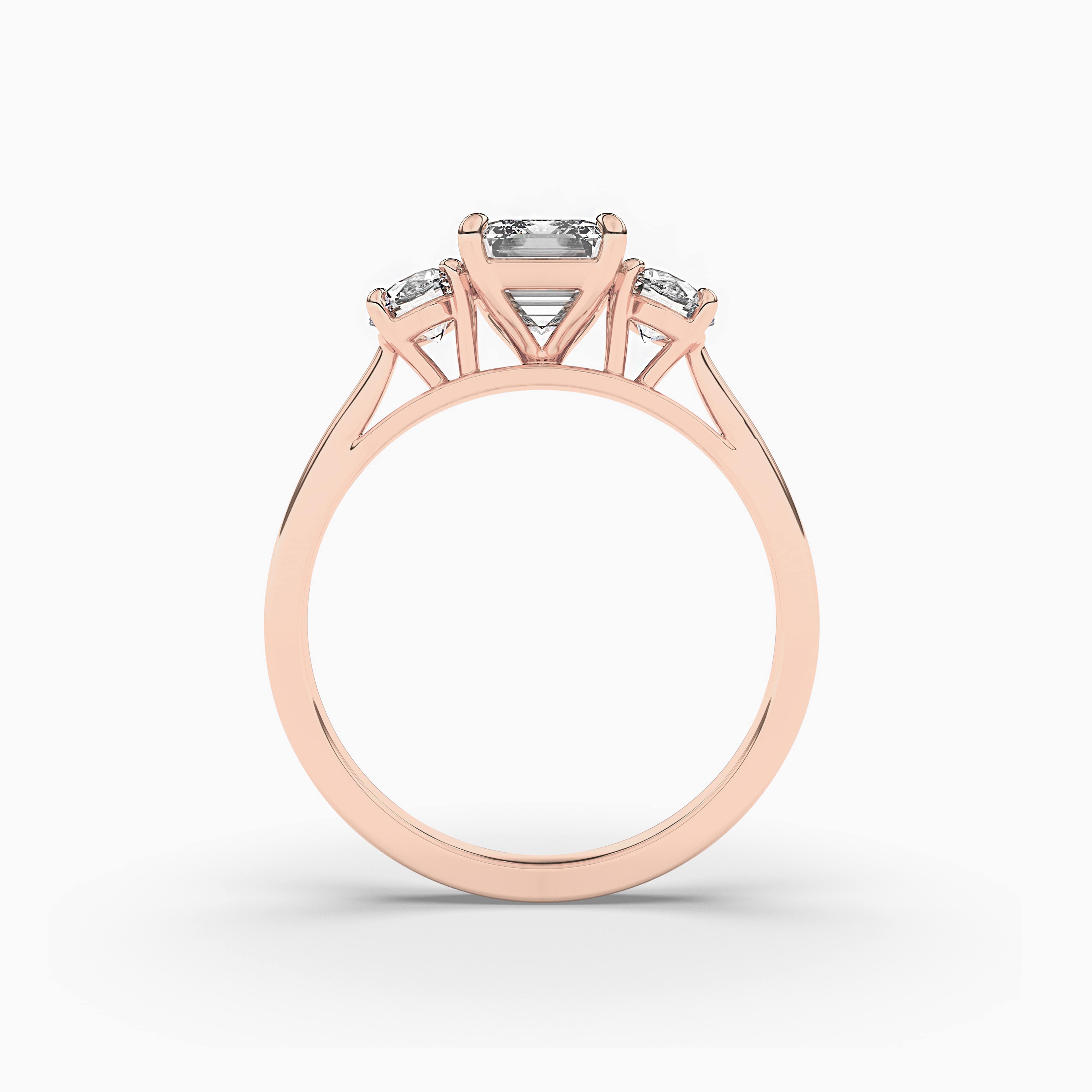 Emerald cut emerald engagement ring rose gold