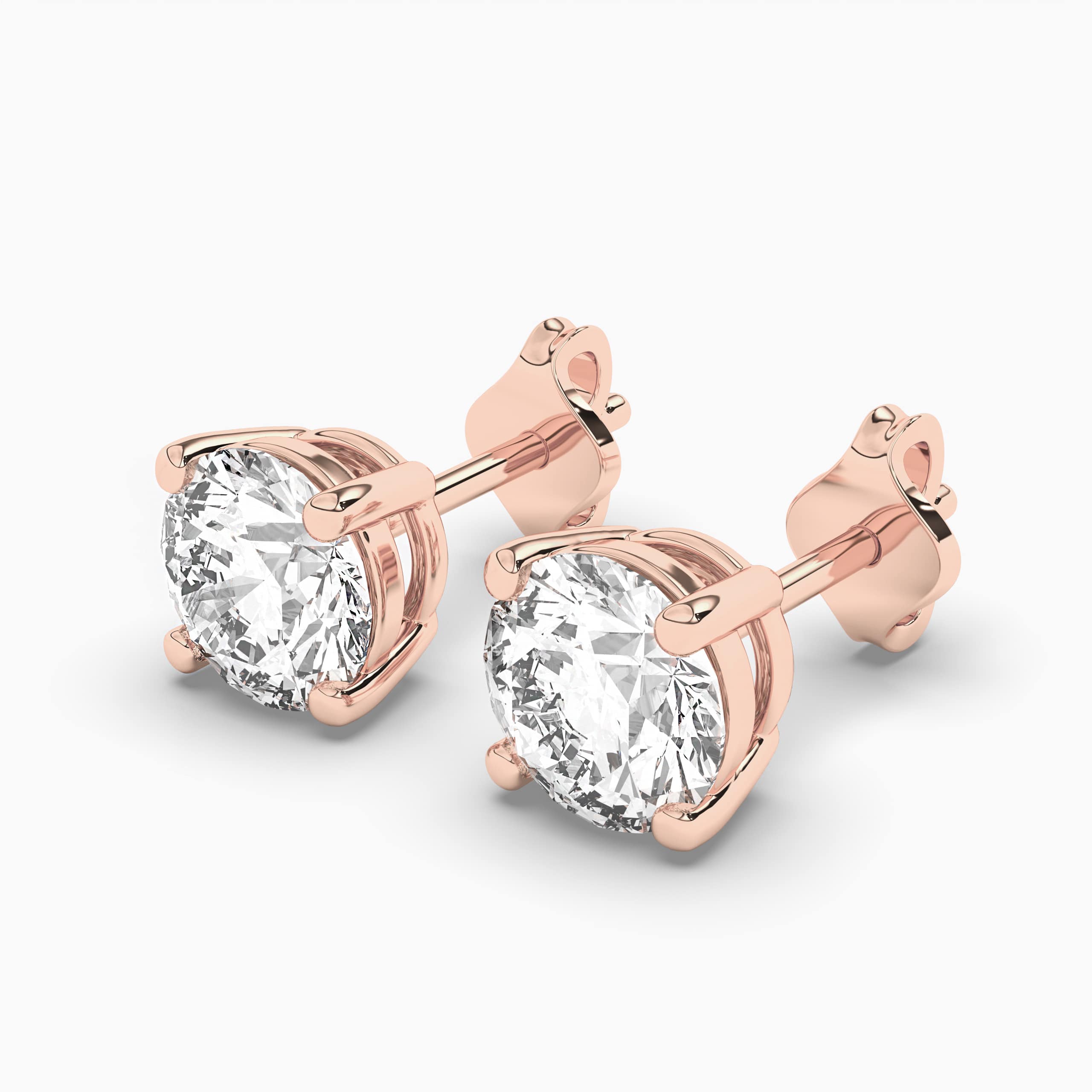 Round Cut Diamond Stud Earrings In Rose Gold