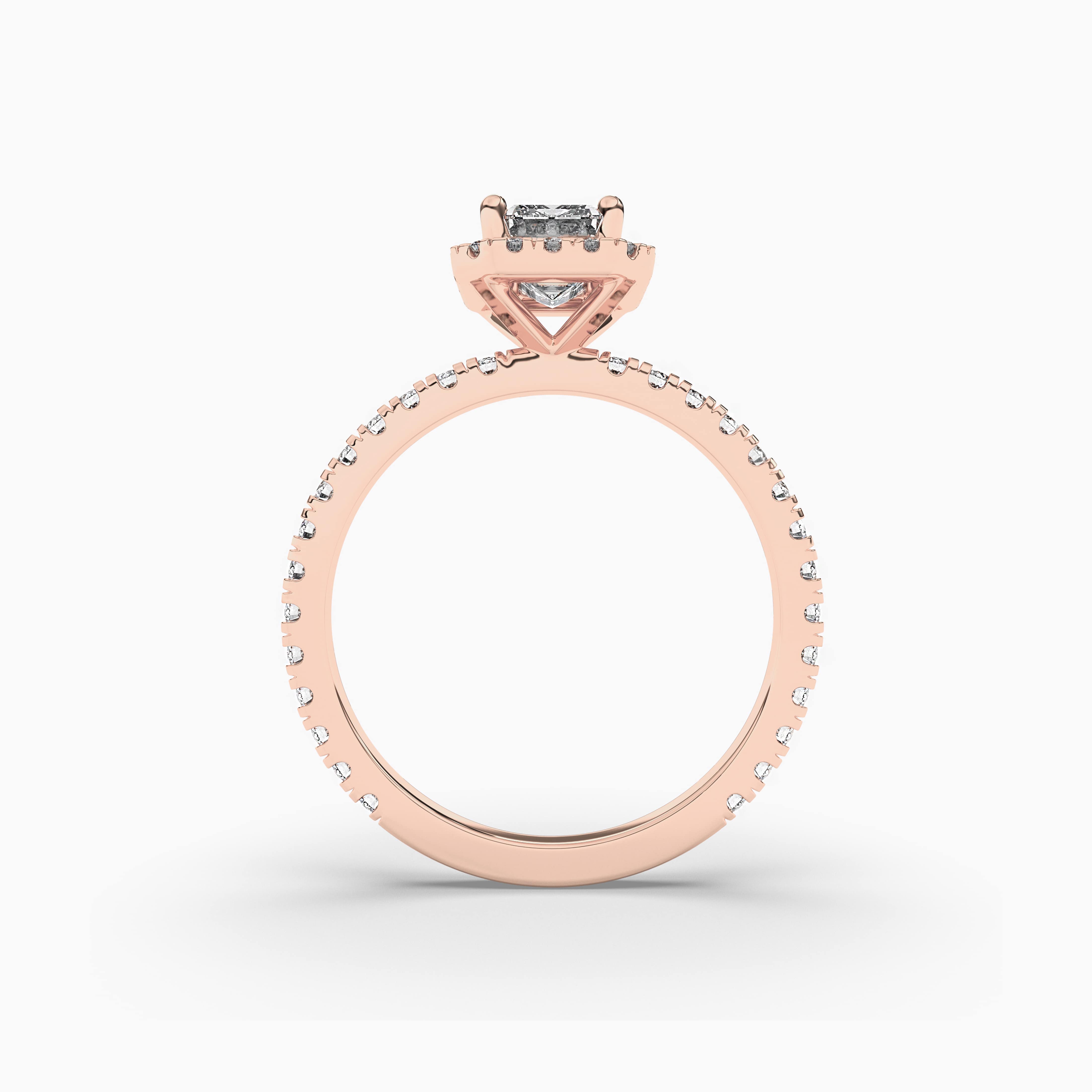 EMERALD CUT DIAMOND ENGAGEMENT RING WITH A DOUBLE HALO AXIS SETTING IN ROSE GOLD