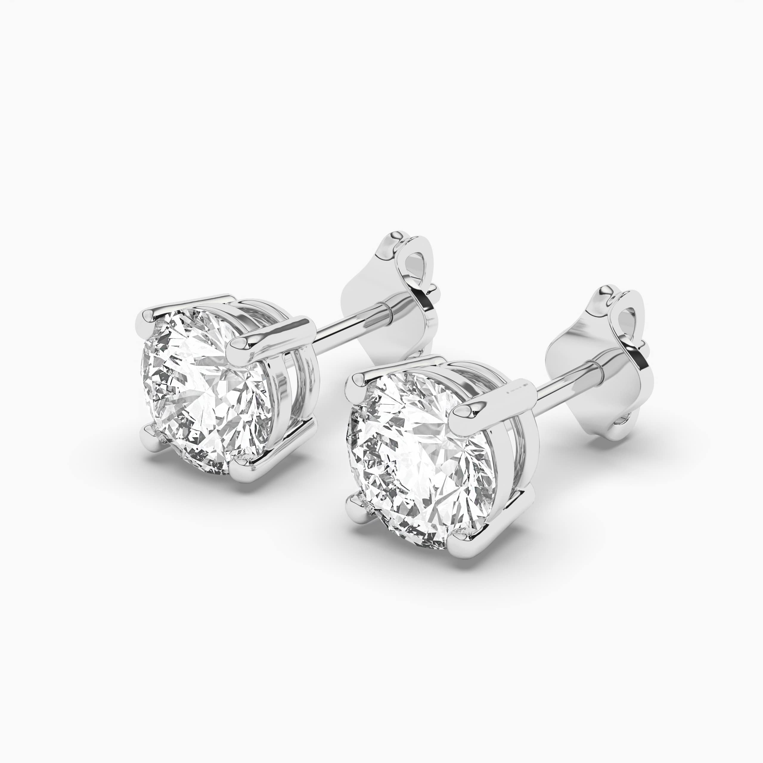 Round Diamond Stud Earrings In White Gold