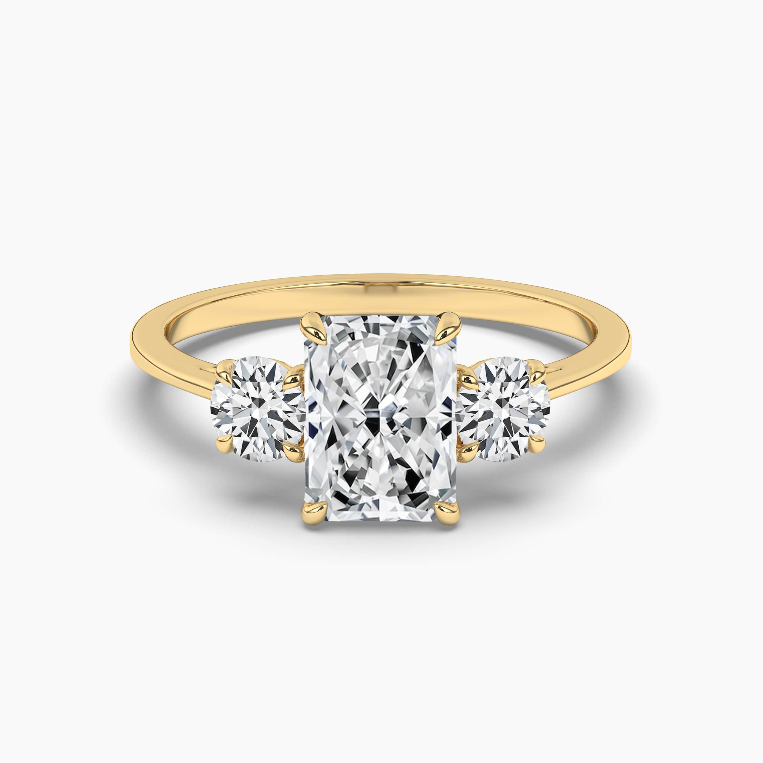 Three Stone Engagement Ring With Pear Side Stones and Radiant Cut