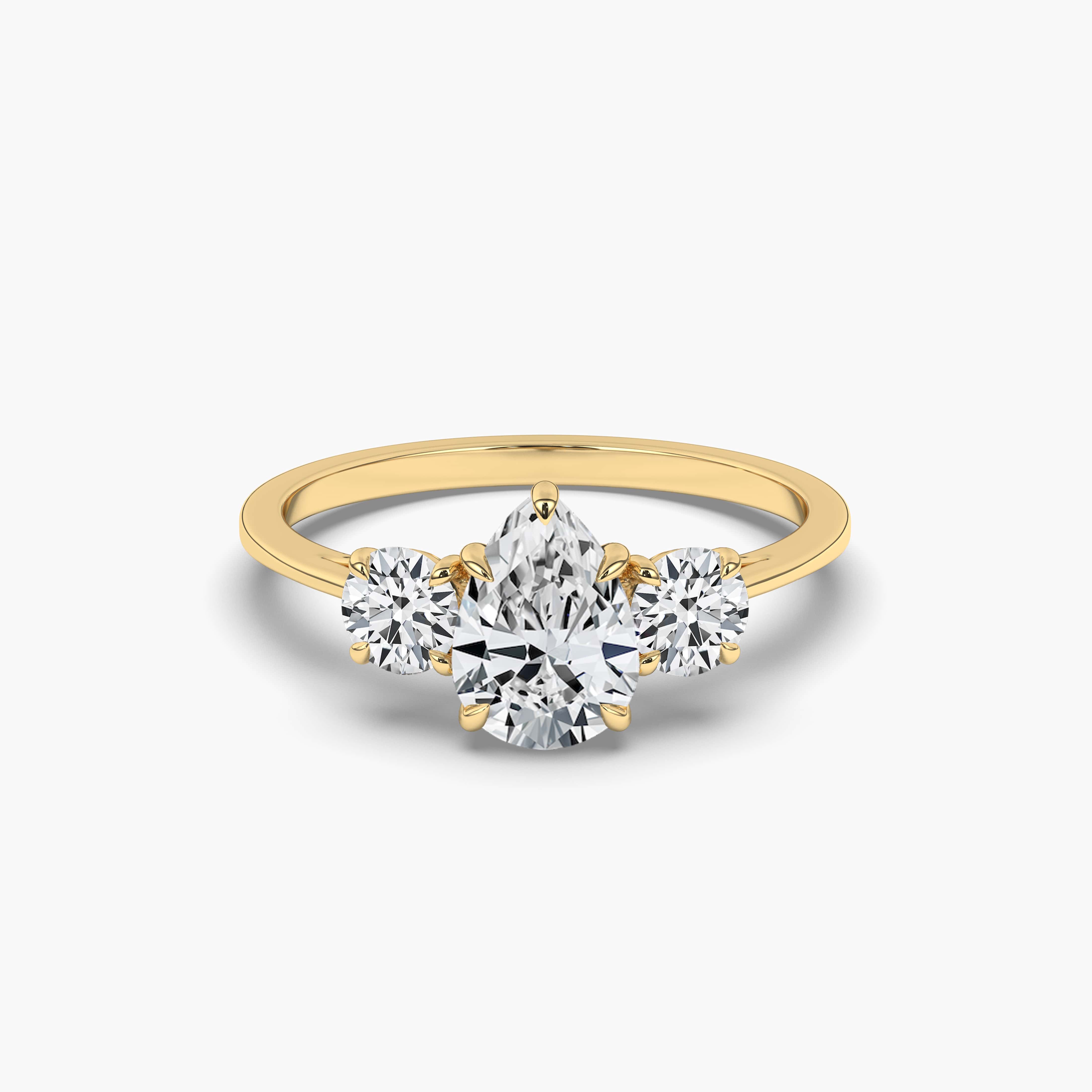 The Three Stone Pear Engagement Ring