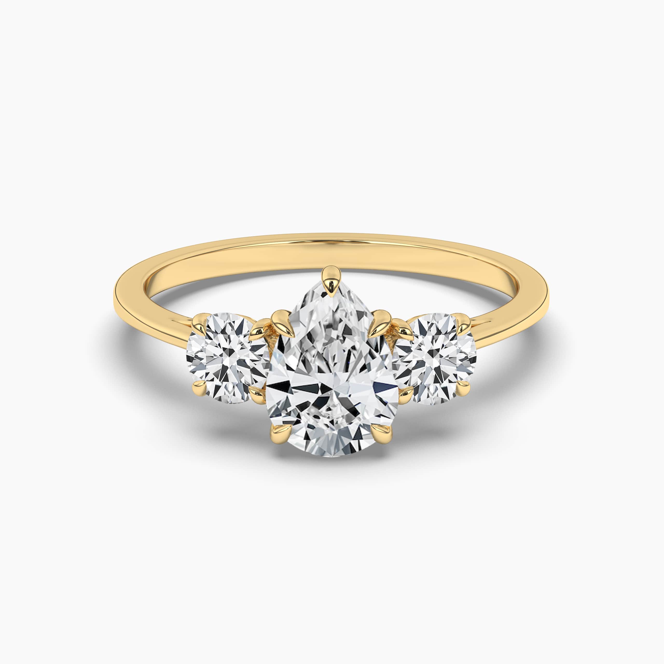 The Three Stone Pear Engagement Ring
