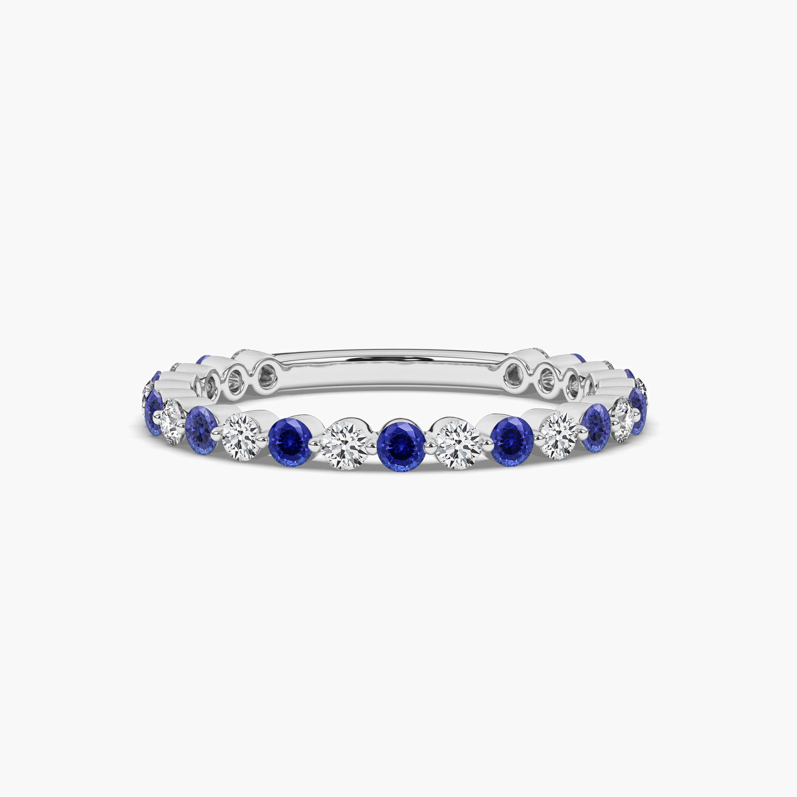 BLUE SAPPHIRE AND DIAMOND ETERNITY BAND IN WHITE GOLD