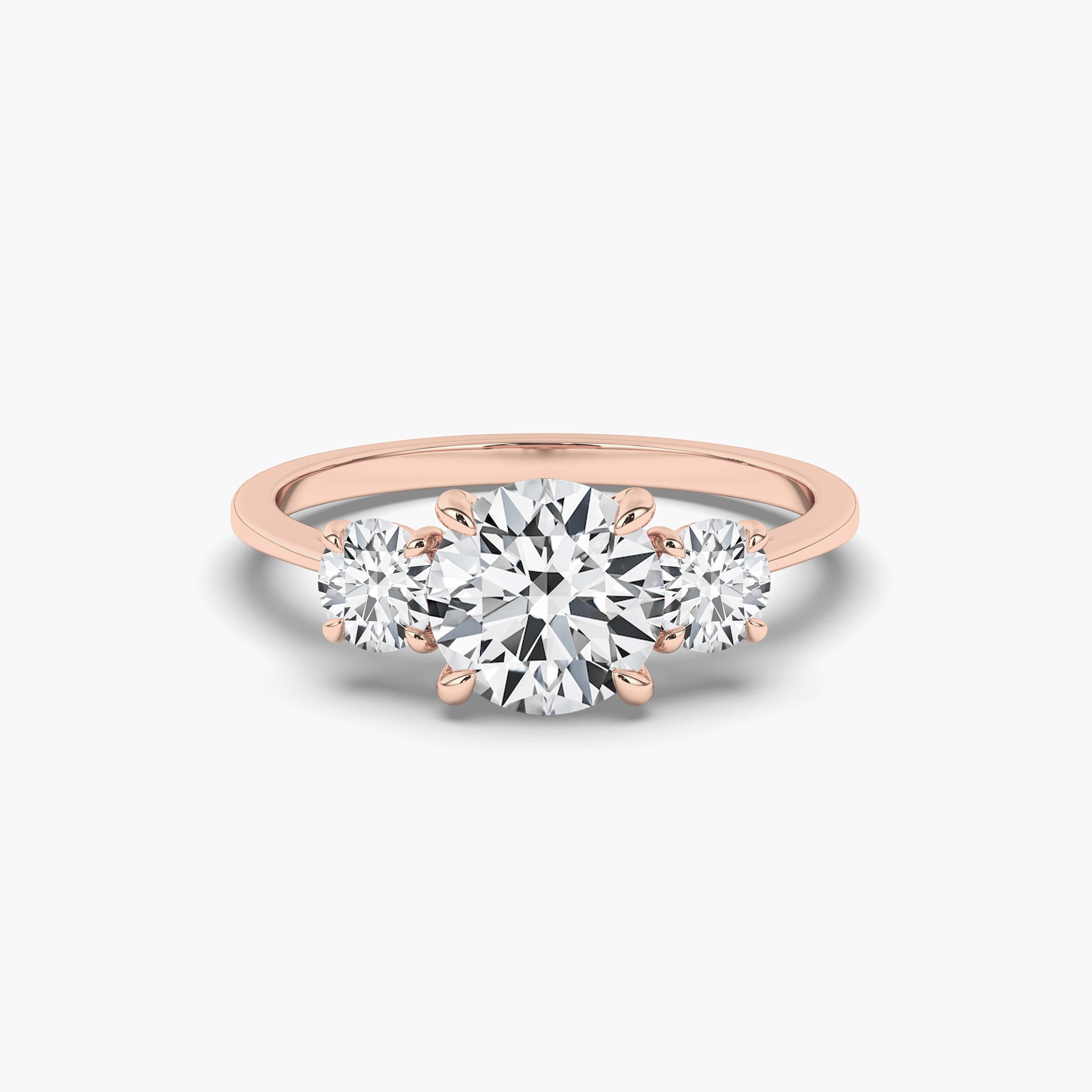 ROSE GOLD ROUND CUT DIAMOND ENGAGEMENT RING WITH SIDE DIAMONDS