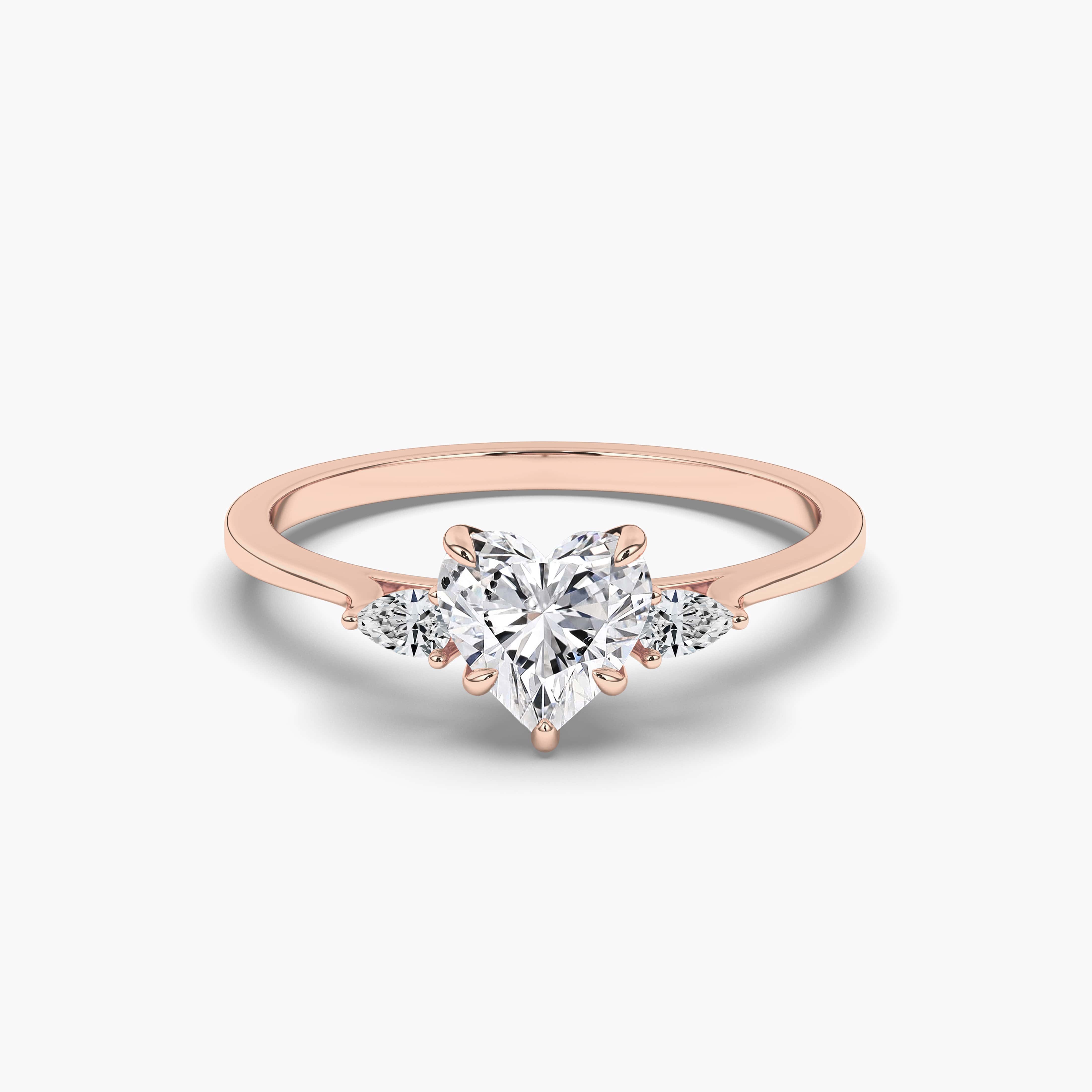 Rose Gold Heart Shape Diamond With Pear Cut Side Stones Ring 