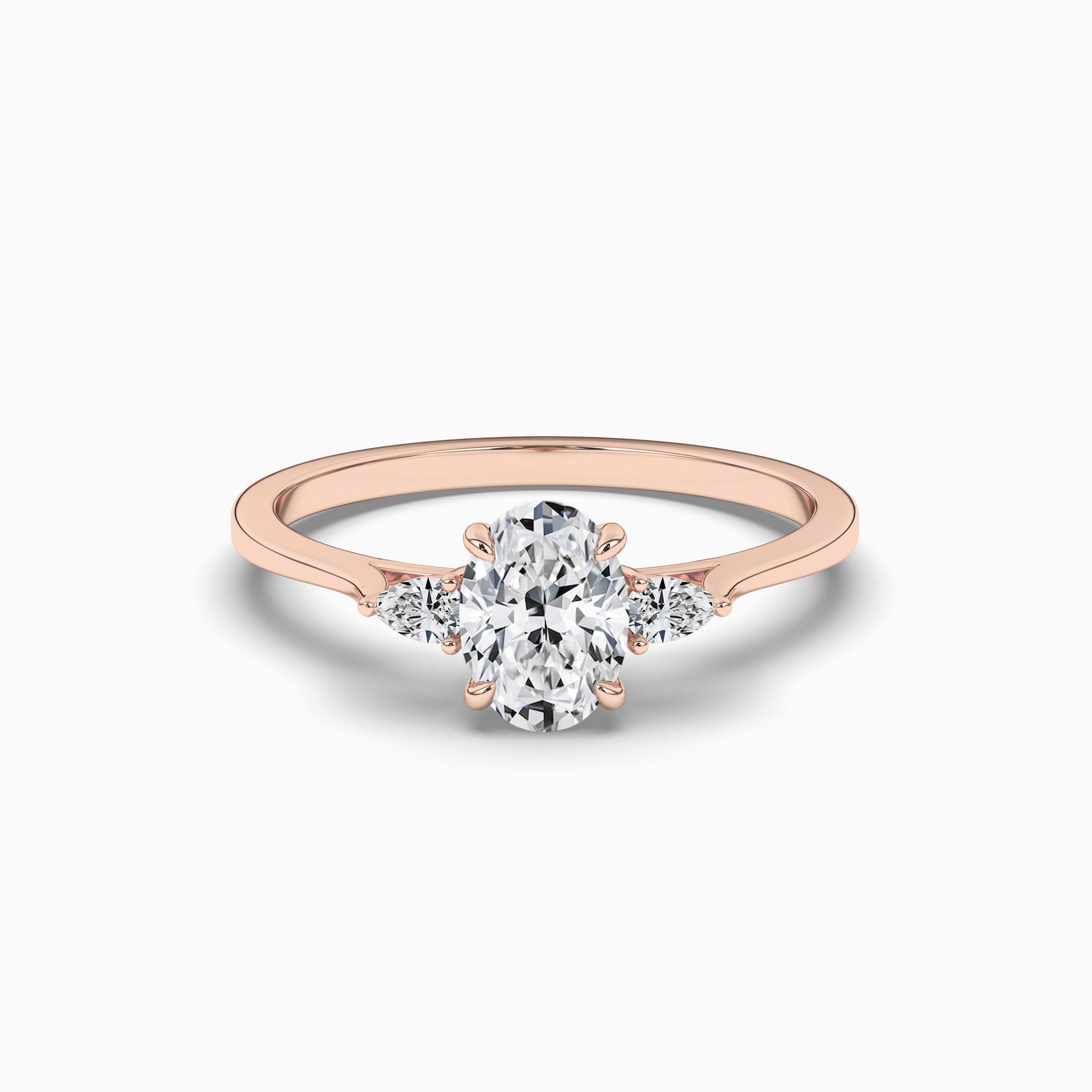Oval Shape Diamond Engagement Ring With Pear Shape Side Stones