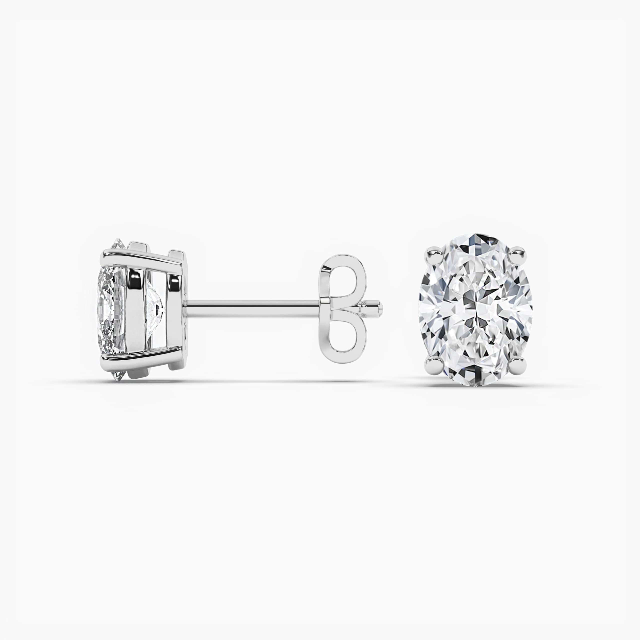 OVAL-CUT DIAMOND STUD EARRINGS WHITE GOLD