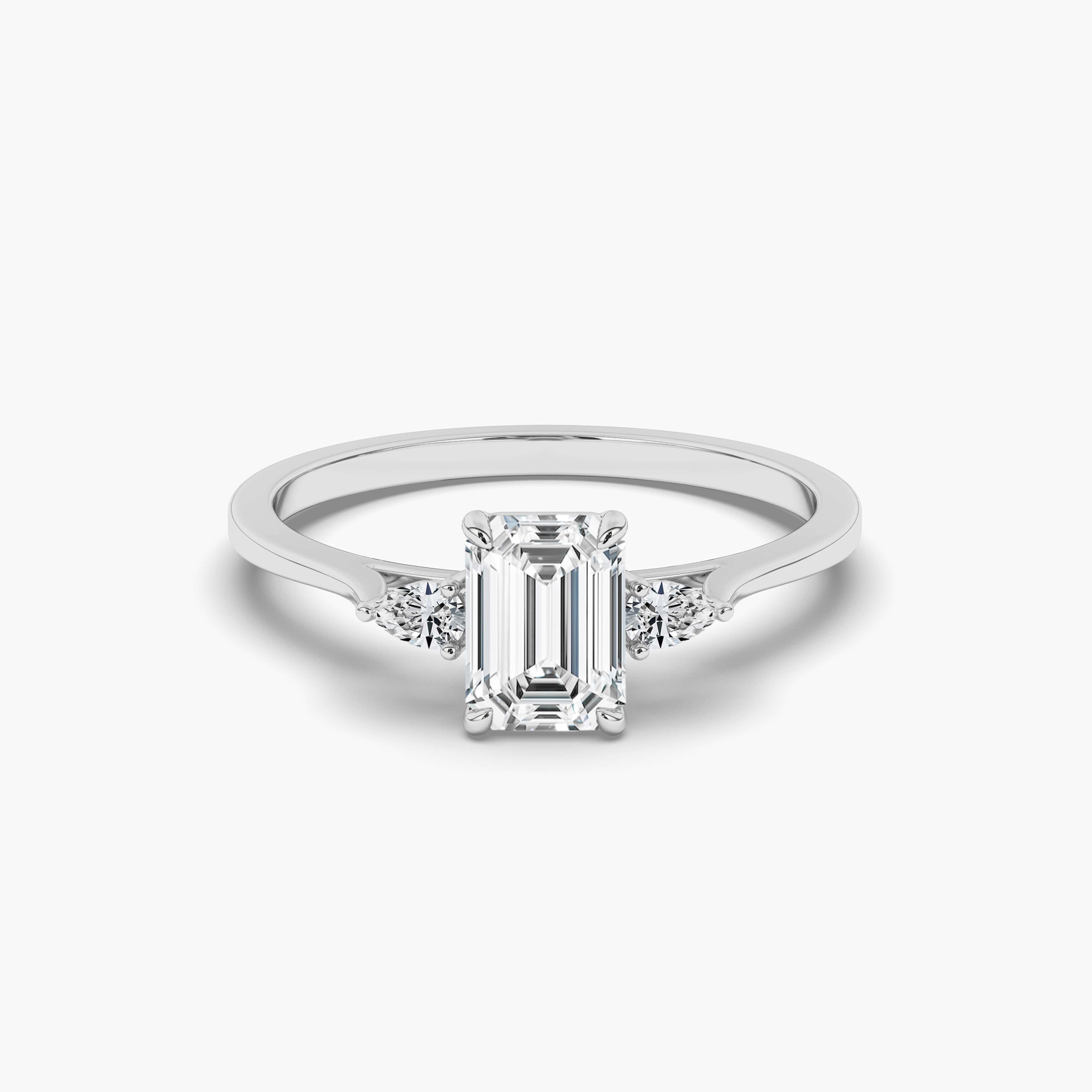 Emerald Cut Engagement Ring With Pear Side Stones