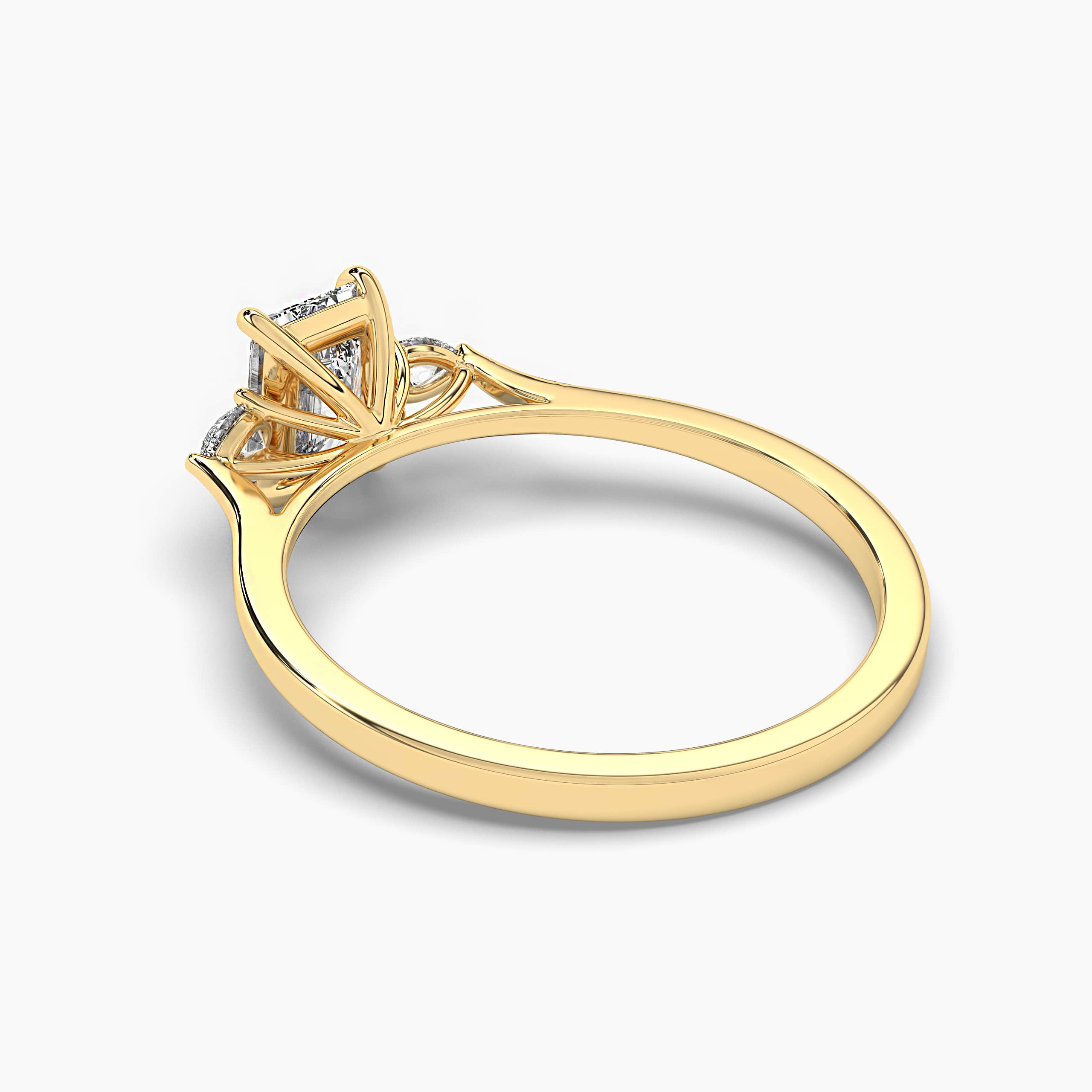 Three Stone Engagement Ring With Pear Side Stones and Radiant Square Cut 