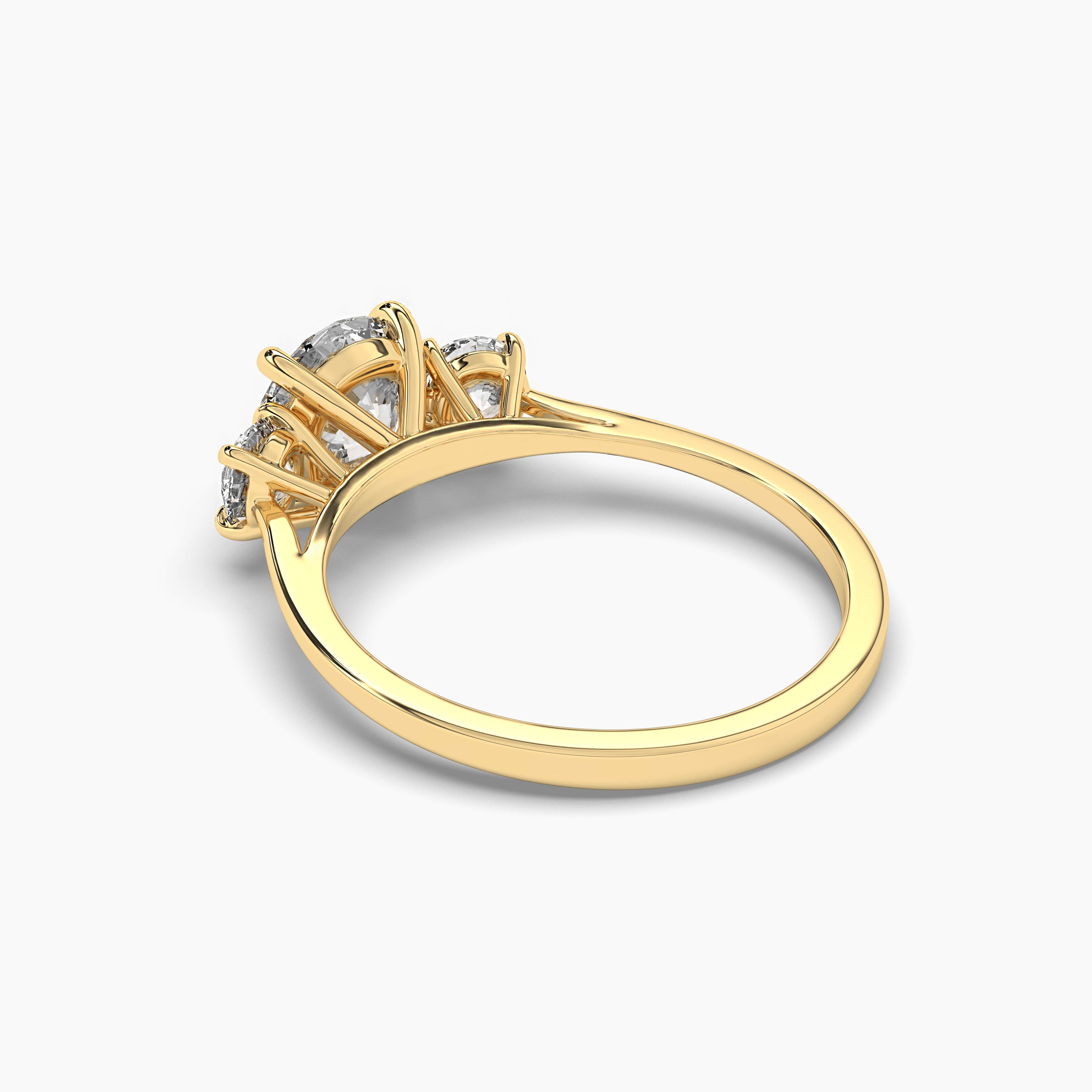 Three Stone Engagement Ring in Yellow Gold