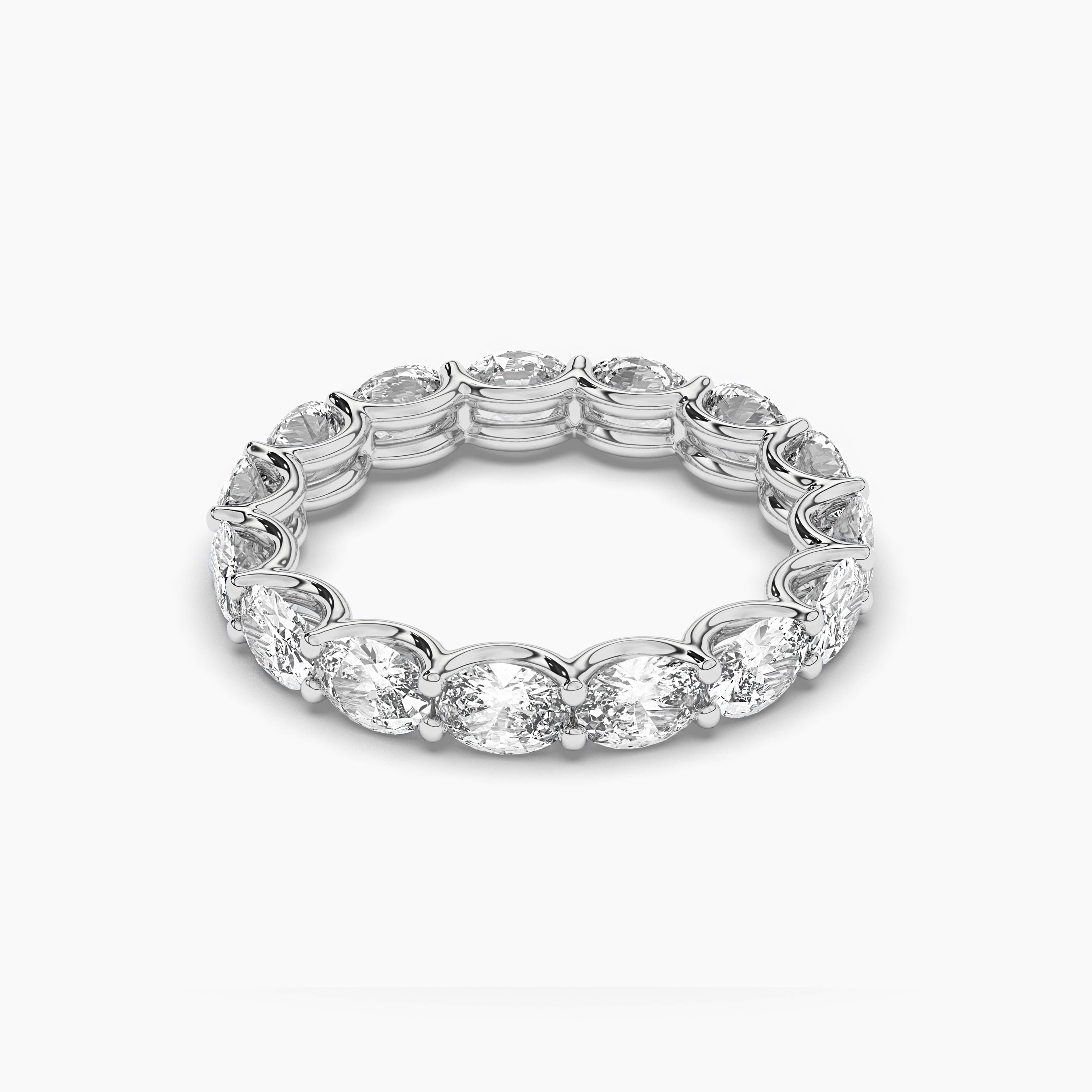 WHITE GOLD BAND WITH OVAL DIAMONDS