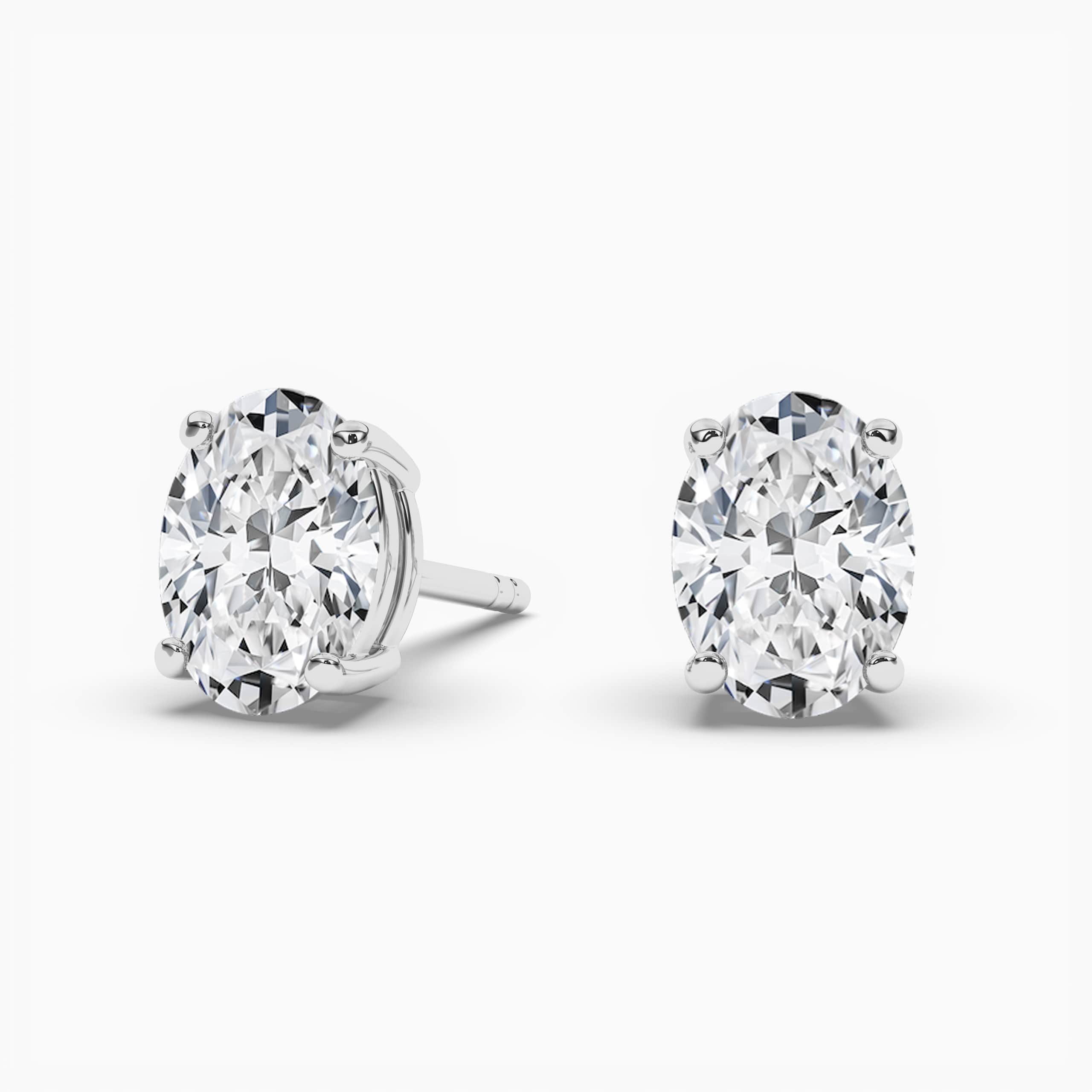 OVAL-CUT DIAMOND STUD EARRINGS WHITE GOLD