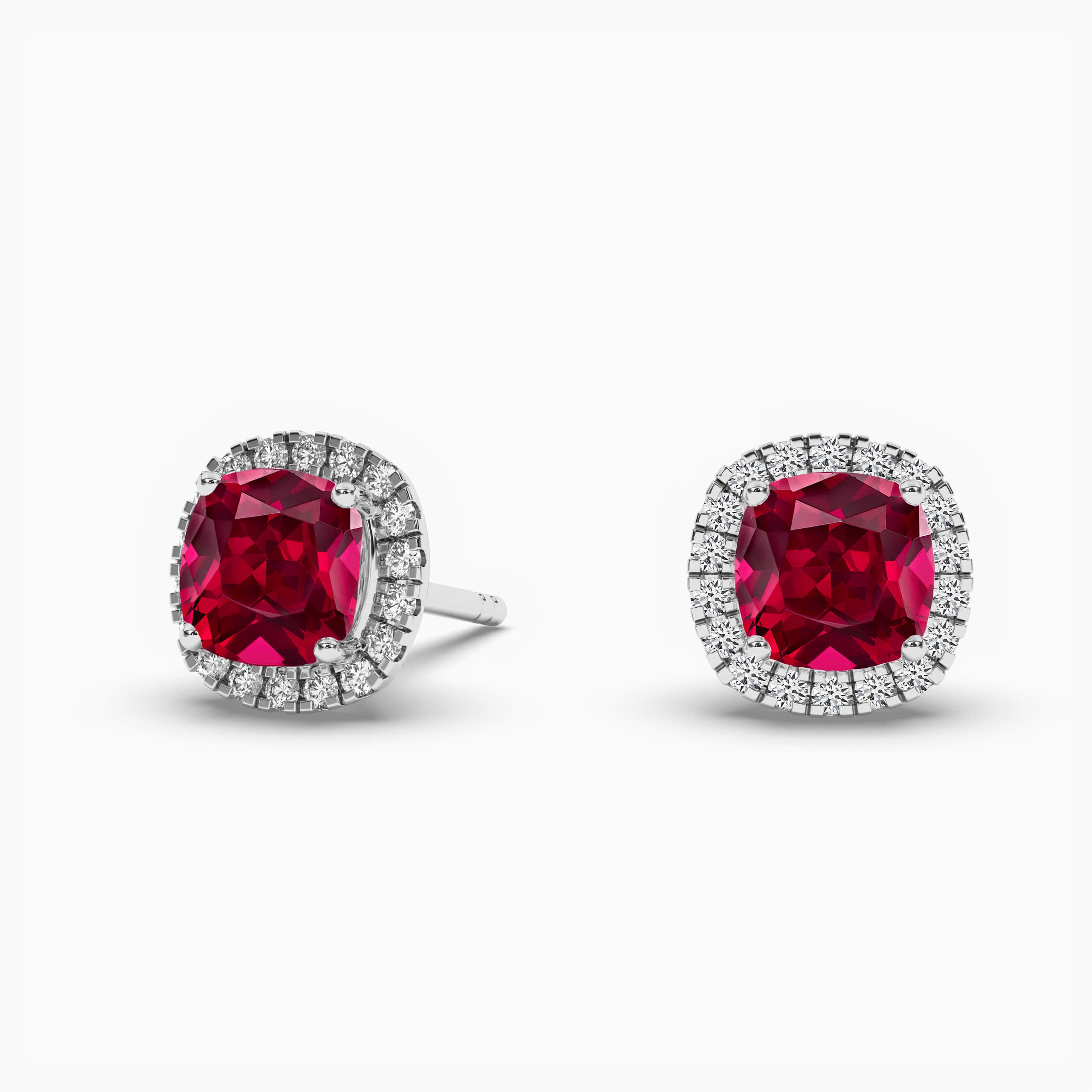 Round Ruby And Cushion Shaped Diamond Halo Stud Earrings In White Gold