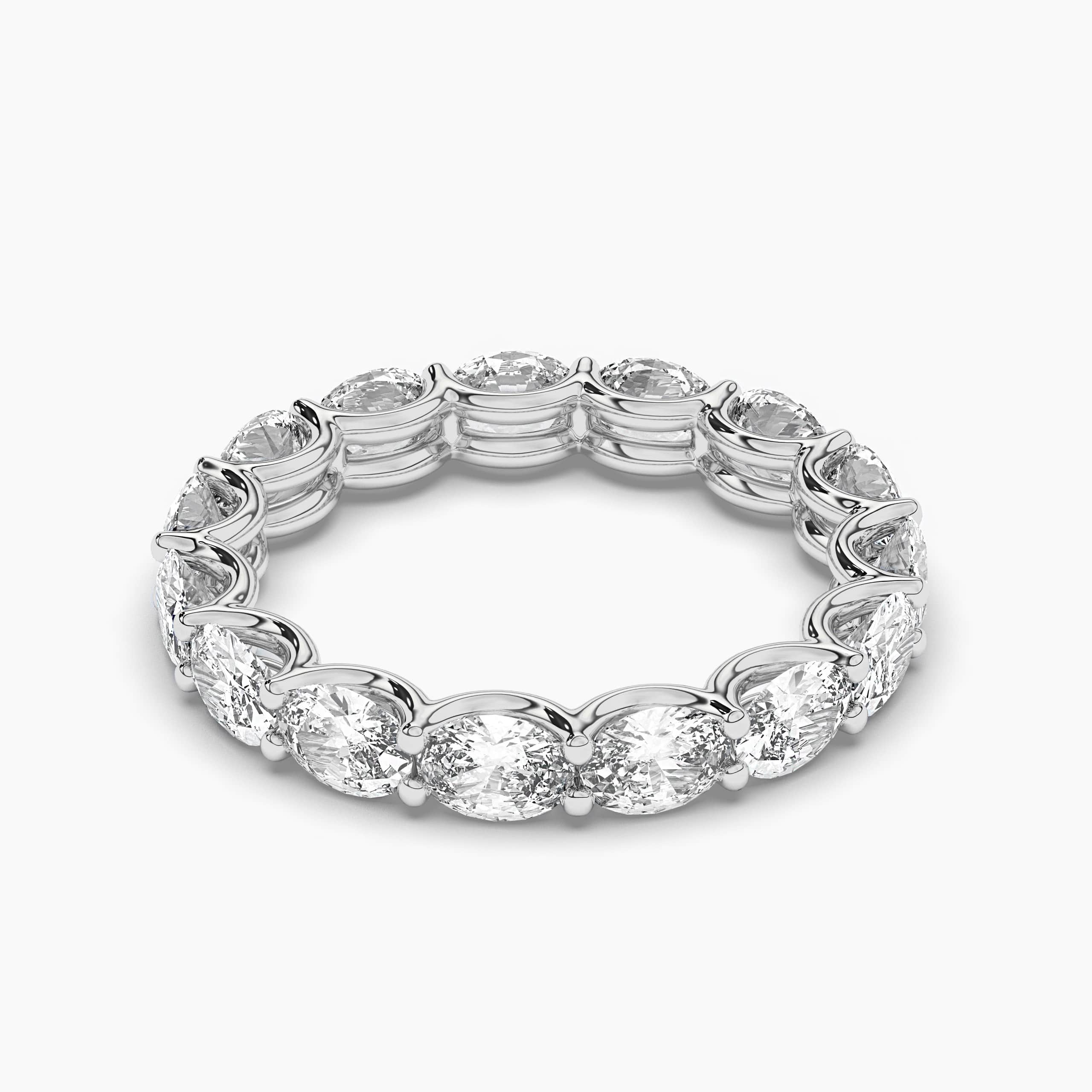 WHITE GOLD BAND WITH OVAL DIAMONDS